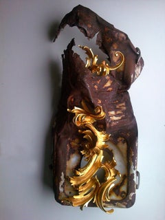 Convivenza, Renaissance style, gold carved wood, reclaimed rusted metal object