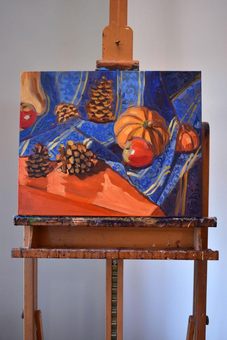 <p>Artist Comments<br>Artist Tara Zalewsky-Nease depicts an impressionist still life of golden-hued pumpkins, apples, and pinecones. The festive display of the season's harvest lies on a patterned royal blue cloth. Autumnal colors of bright orange