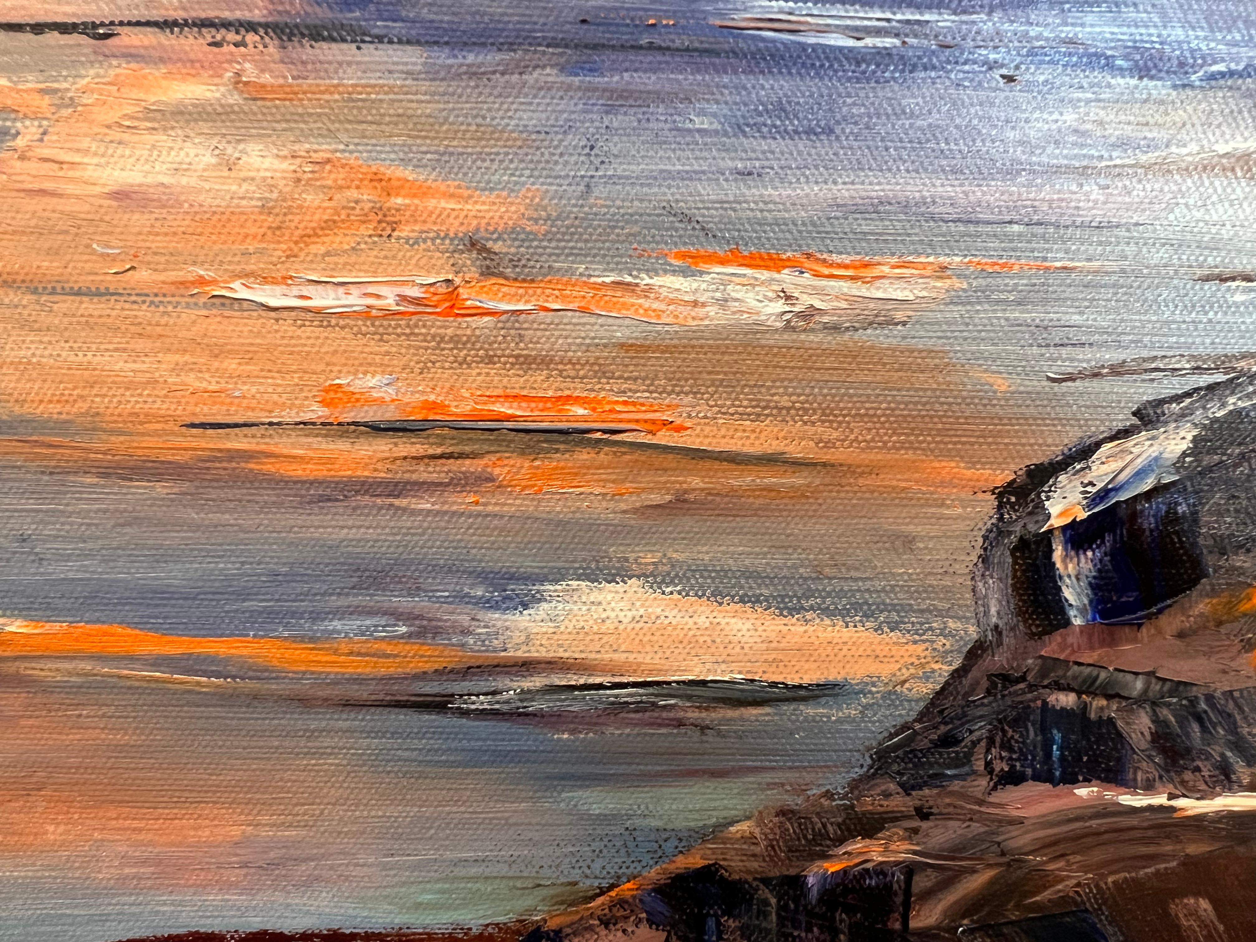 <p>Artist Comments<br>Artist Marilyn Froggatt displays a spectacular perspective of a vast mountain range encompassing Hyalite Lake. The incredible sunset illuminates the majestic sky and reflects on the tranquil surface of the water. 