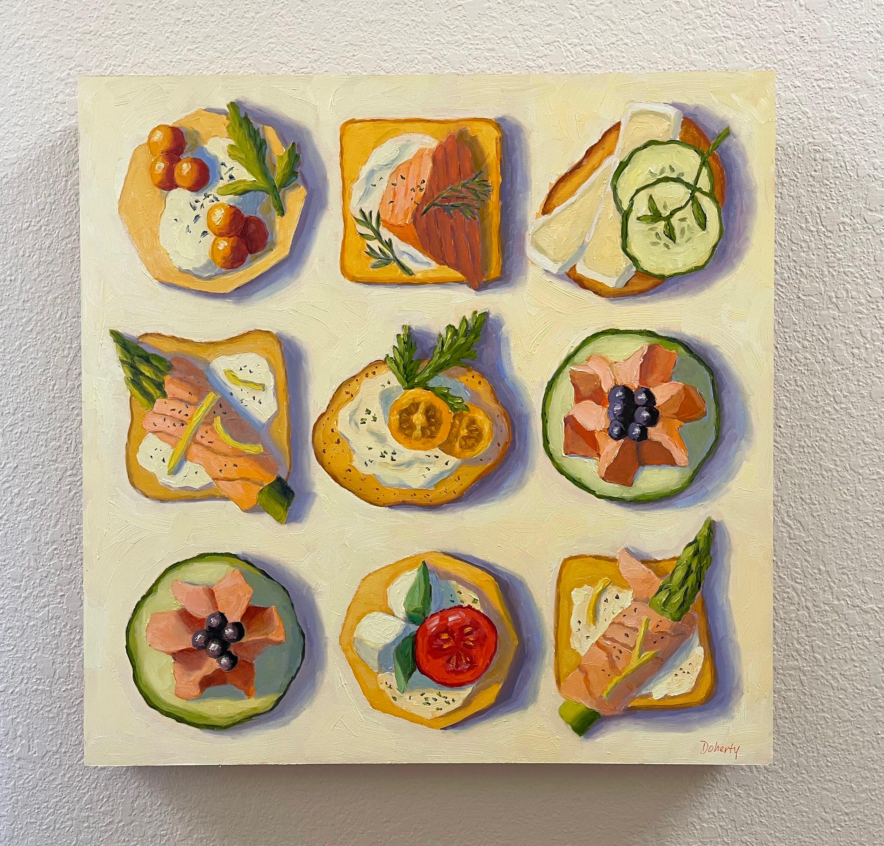 <p>Artist Comments<br>Artist Pat Doherty presents an assortment of twelve canapes in a geometric pattern. Various crackers, toasts, and cucumber slices are topped with delicacies, including caviar, smoked salmon, brie with cucumber, tomato,