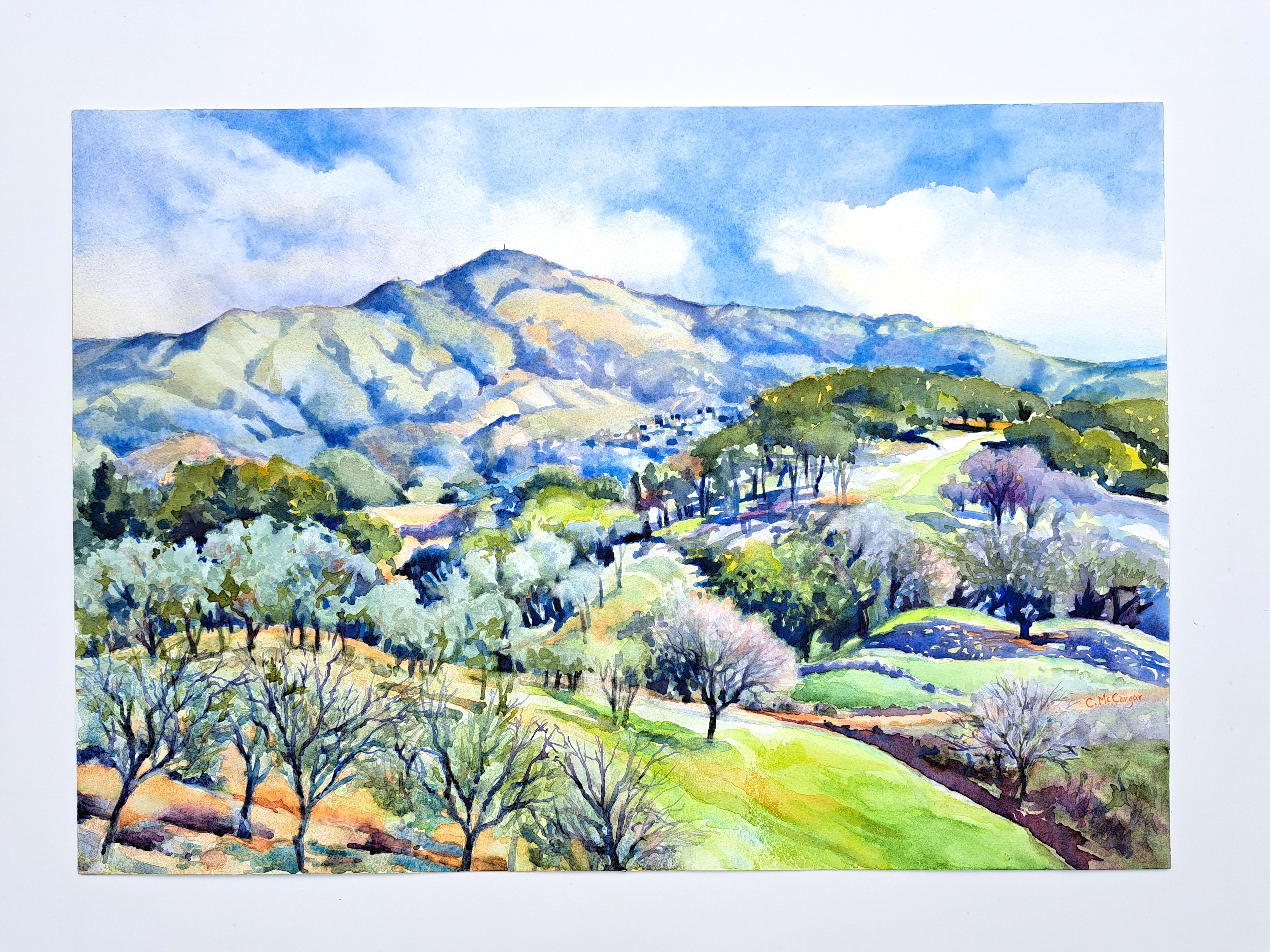 <p>Kommentare der Künstlerin<br>Die für ihre Landschaften bekannte Künstlerin Catherine McCargar präsentiert einen Blick auf den Mt. Diablo und seine umliegenden Ausläufer. Der große und stolze Berg blickt auf die grünen Hänge und üppigen Bäume. Die