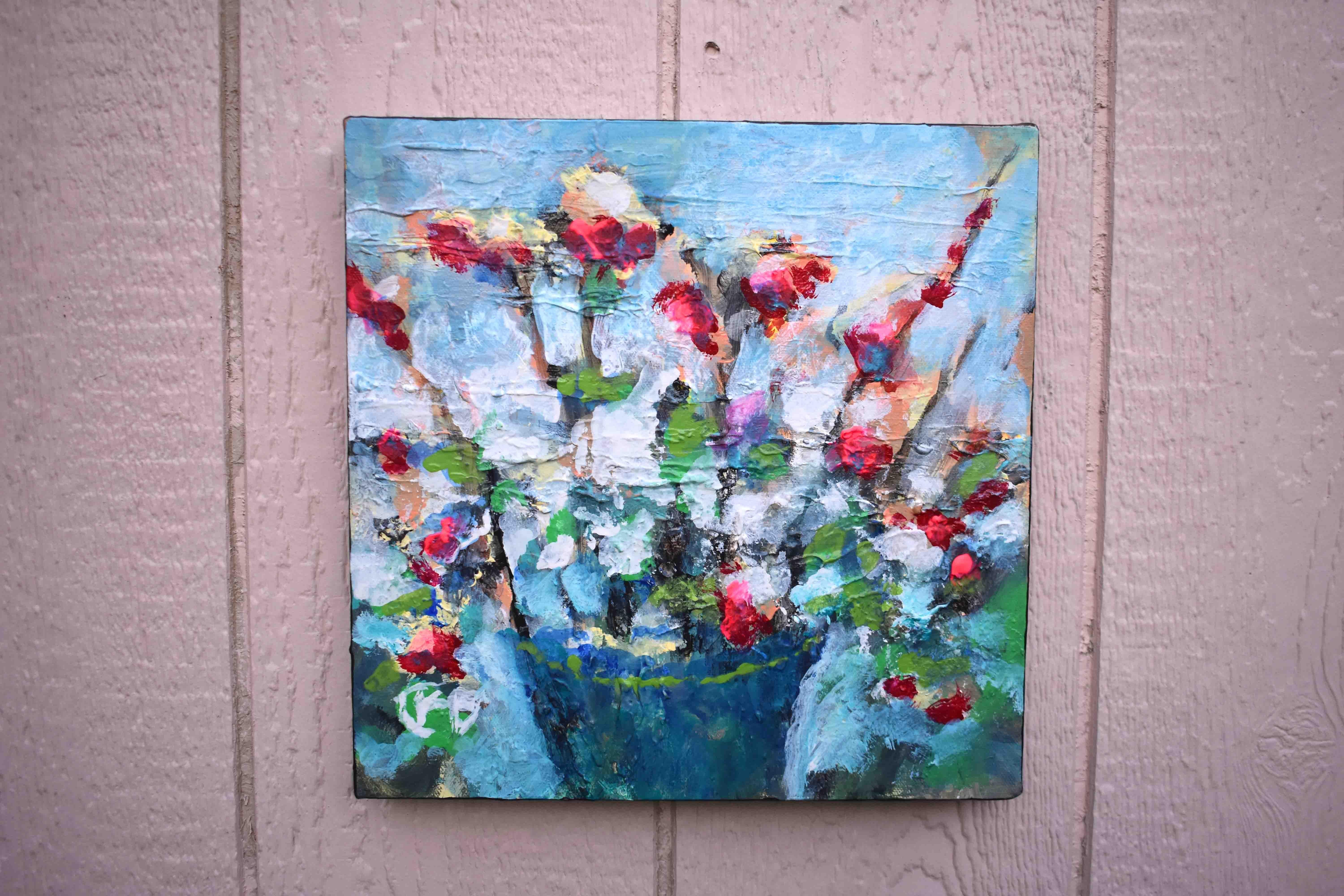 <p>Artist Comments<br>Artist Kip Decker presents a lightly textured floral expression in a balance of bright and muted tones. He paints flourishing blossoms popping in vibrant red to contrast the softer shades. 