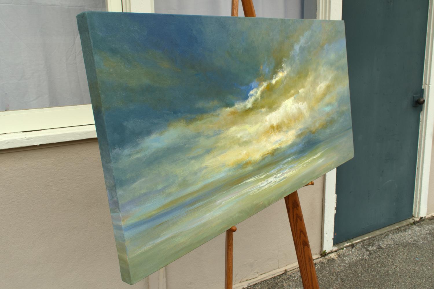 <p>Artist Comments<br>Artist Sheila Finch captures a stunning cloudscape out over the Pacific Ocean in the late afternoon. She creates luminous depth and clarity with layers of golden clouds and subtle glazes. Brilliant hues of green and yellow