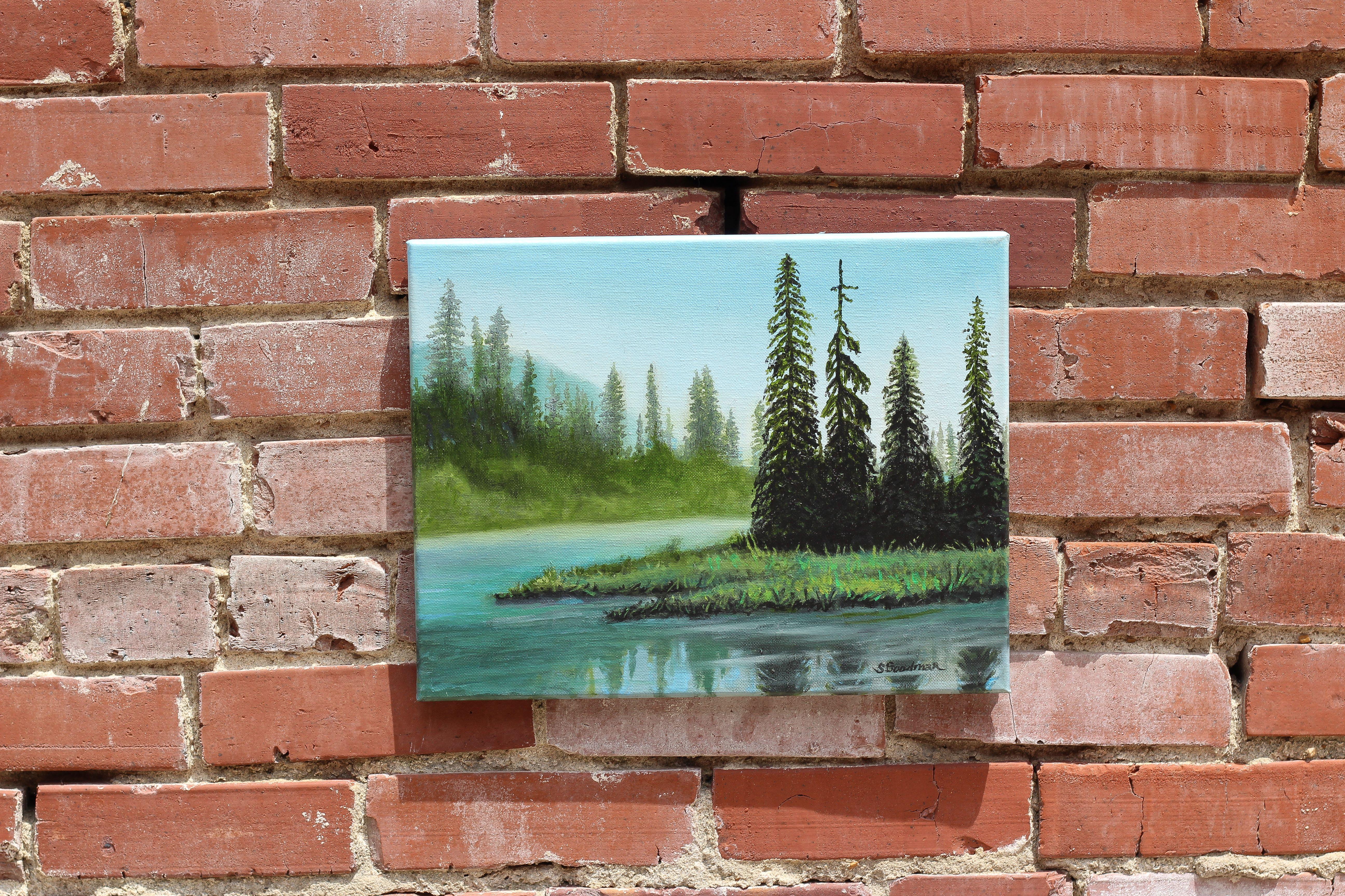 <p>Artist Comments<br>Artist Shela Goodman paints tall pine trees along a winding river. The stream runs through the banks with inviting serenity. Shela creates depth by enveloping the distant bank with a quiet fog. She renders the scene with