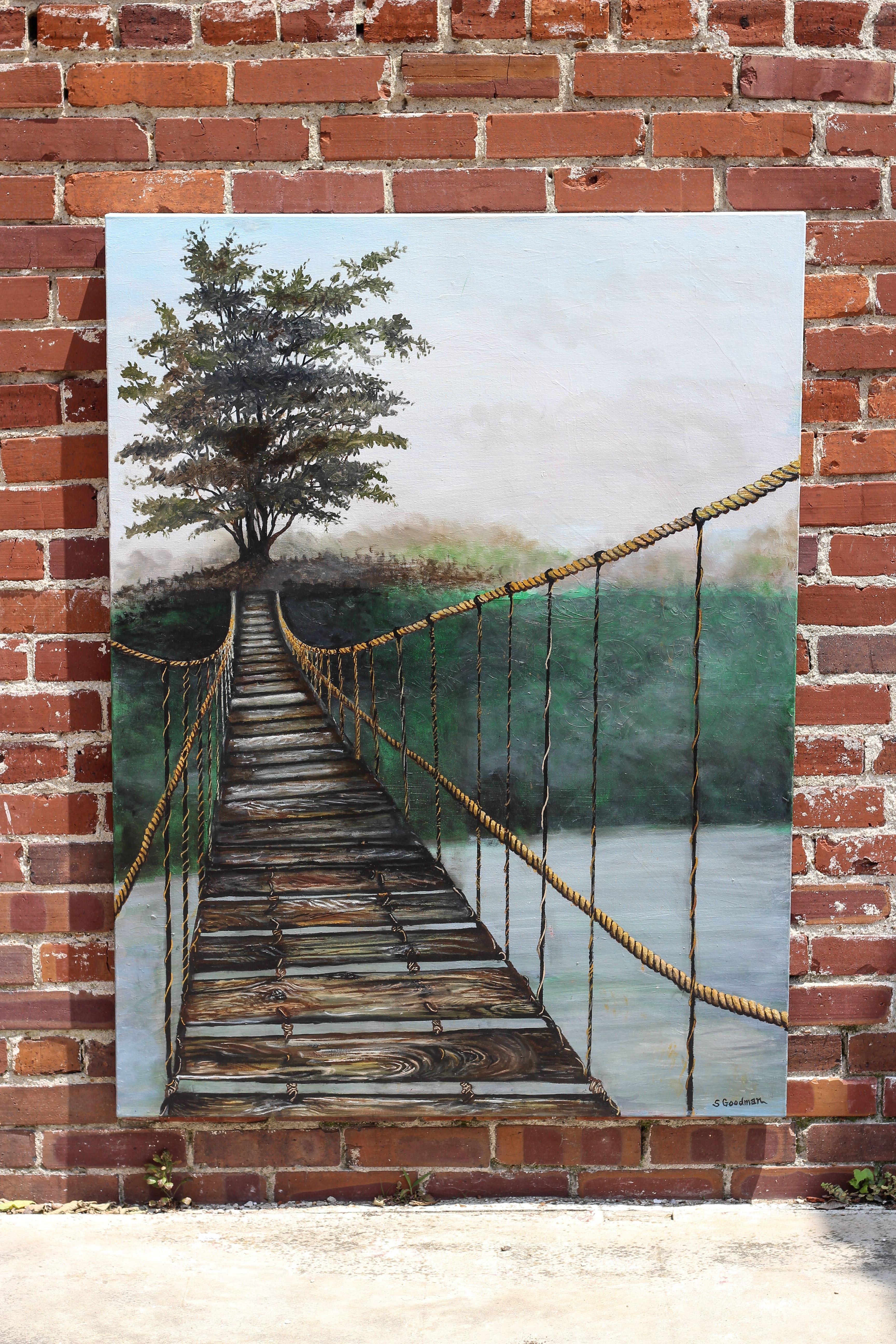 <p>Commenti dell'artista<br />L'artista Shela Goodman presenta una veduta di un vecchio ponte oscillante su un fiume tranquillo. L'immagine gioca con l'immaginazione dello spettatore e lo sfida con la sua visione personale. 