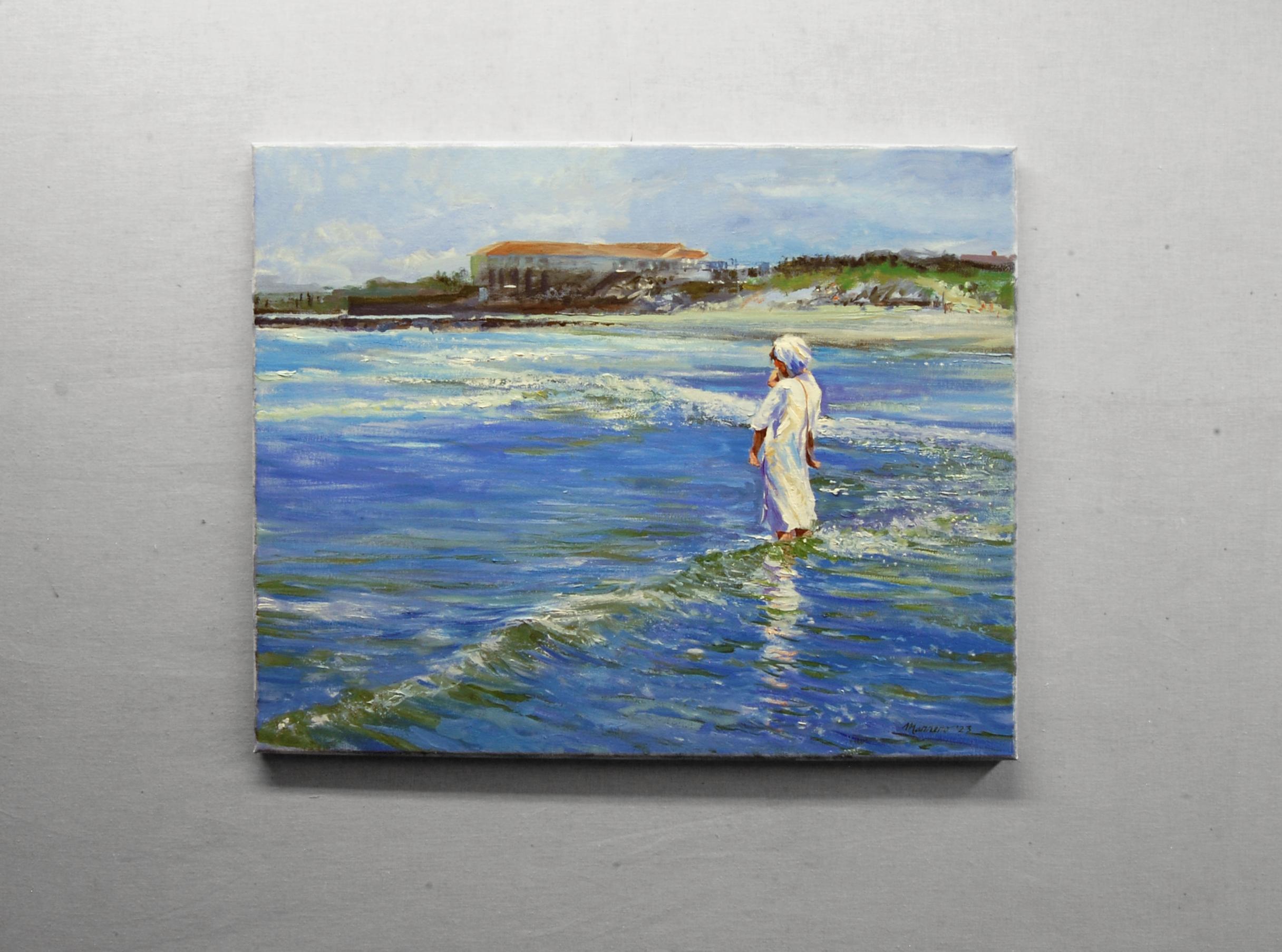 <p>Artist Comments<br>Artist Onelio Marrero captures a gentle moment of a Hasidic mother and her child enjoying the surf as the tide rolled in. While out on the New Jersey seashore, Onelio catches this tender sight, relishing in the refreshing