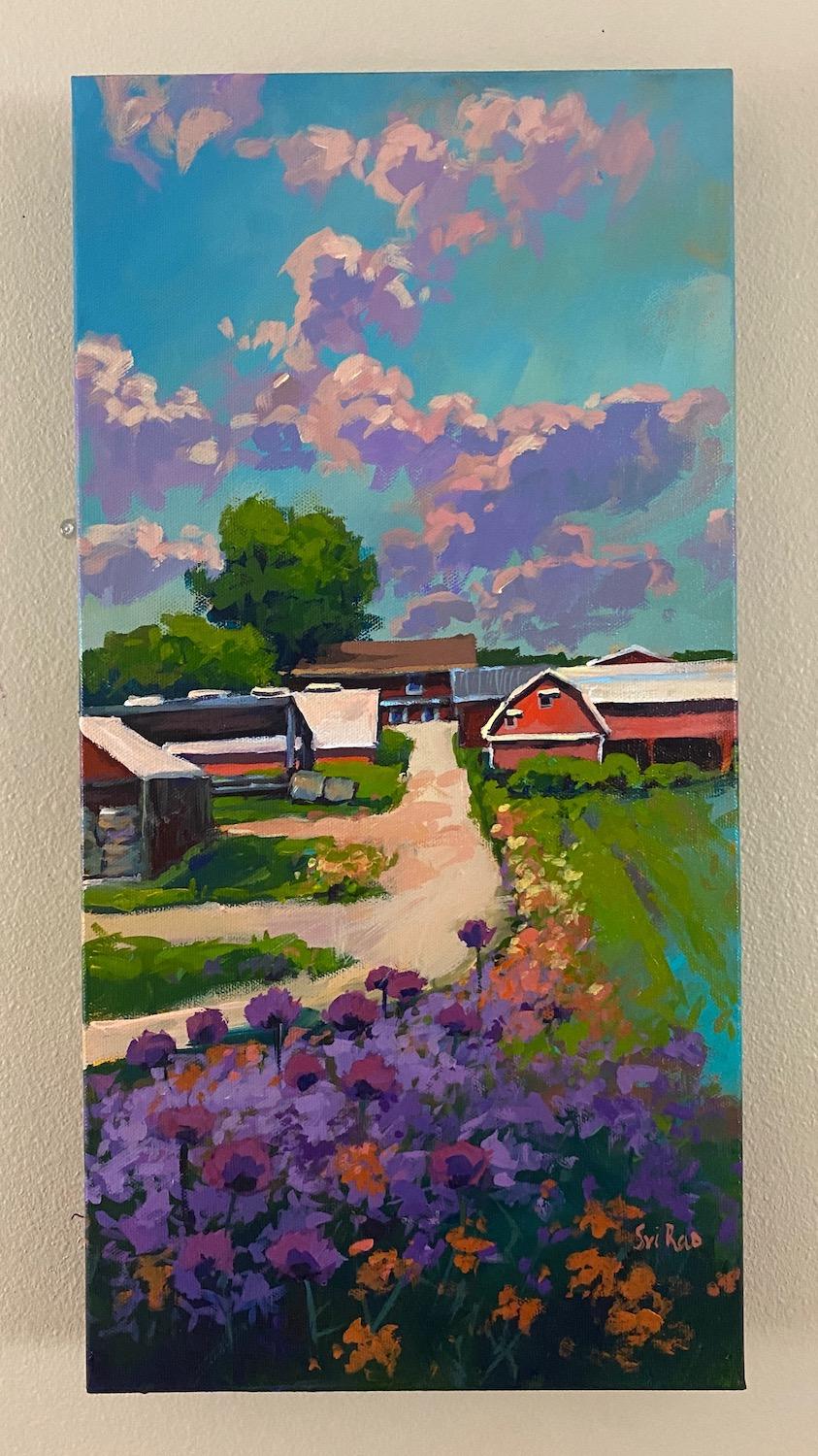 <p>Artist Comments<br>Artist Sri Rao depicts a beautiful spring day where purple flowers line the path toward a red barn. The petals mirror the soft, dreamy clouds in the sky, creating a harmonious dance of colors and nature's beauty. The artwork