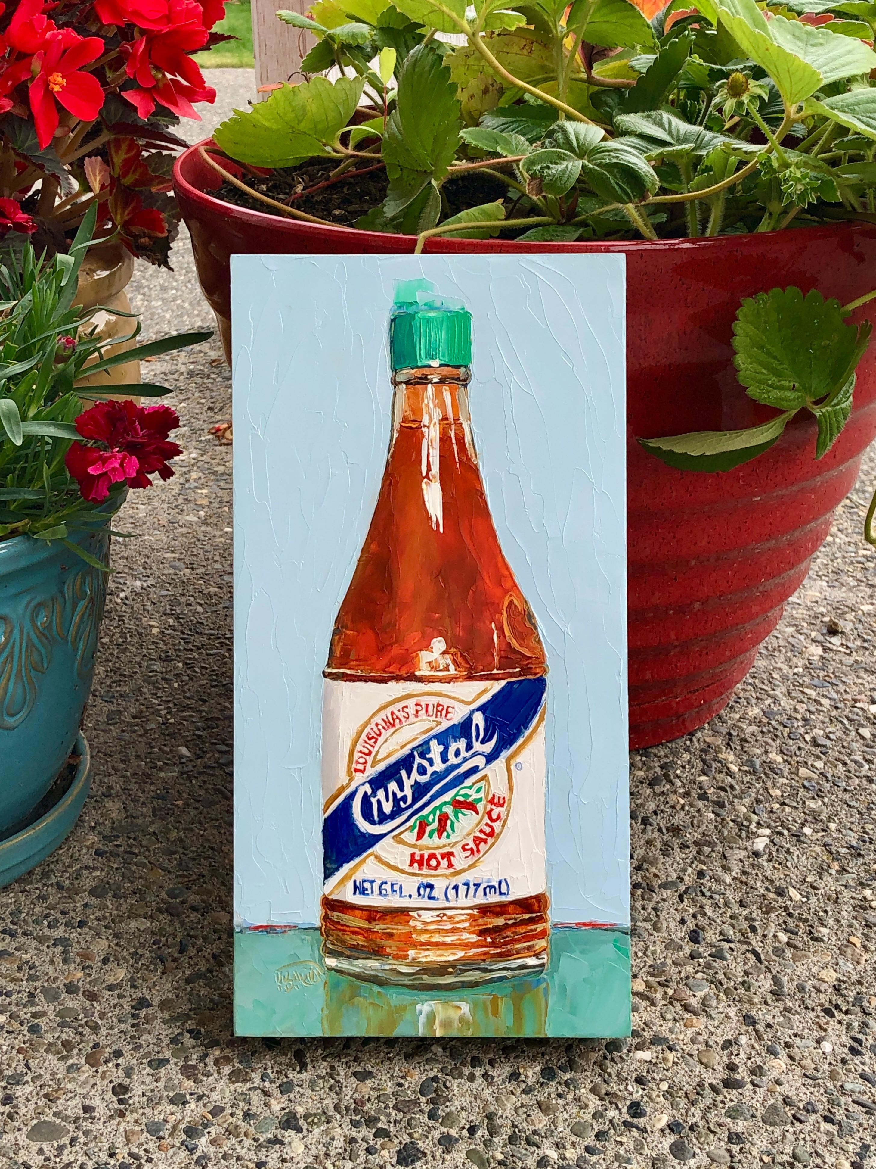 Crystal Hot Sauce, Oil Painting - Blue Still-Life Painting by Karen Barton
