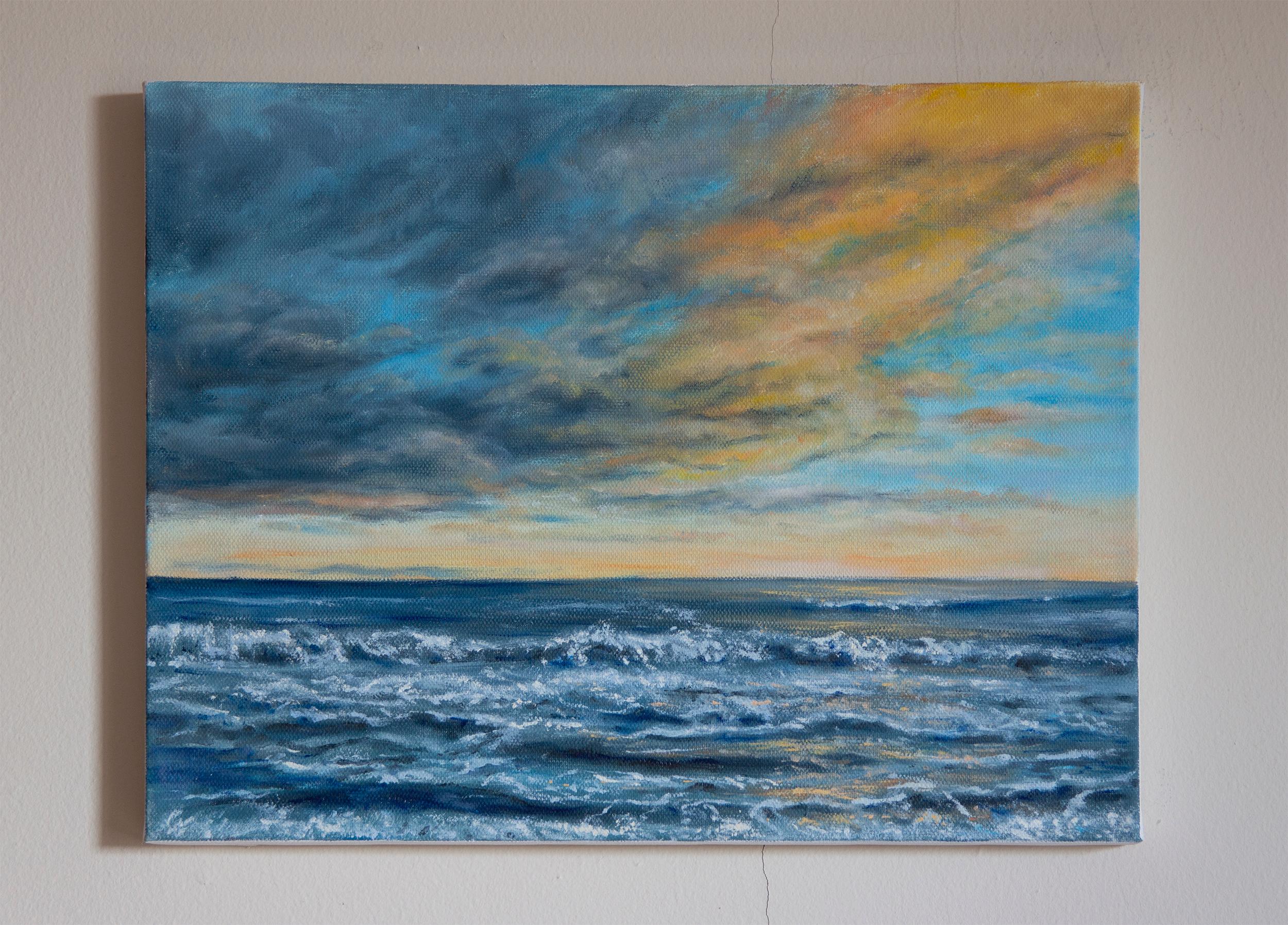 <p>Artist Comments<br />Inspired by the shores of the Hamptons, artist Olena Nabilsky paints crashing waves approaching an unseen shore. The interplay of bright light on dark clouds brings a soft, warm glow, casting golden reflections on the tides.