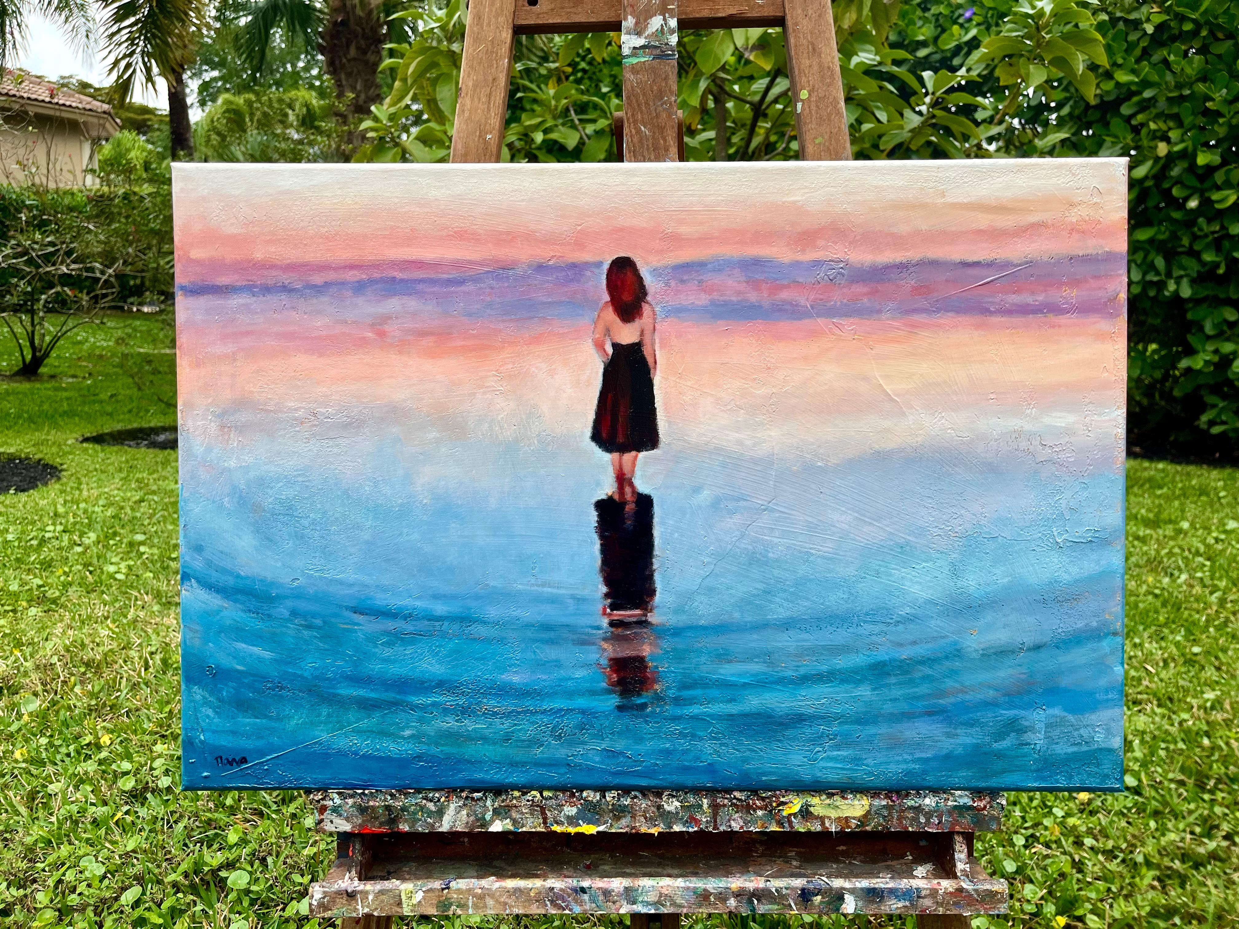 <p>Artist Comments<br>A woman stands in the shallow water, sensing the expansive world around her. The pink and purple sky blends with the sea, creating an image of endless space. The composition invites contemplation and exudes a serene sense of