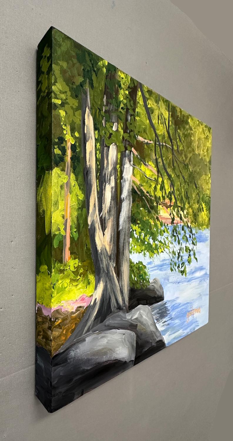 <p>Artist Comments<br>In the scenic beauty of Ontonagon River, Paulding, Michigan, a tranquil scene unfolds. The sun bathes the rocks and trees in the full radiance of summer, while delicate brushstrokes depict the leaves swaying and overhanging the