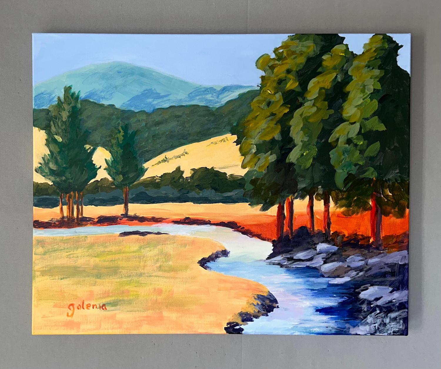 <p>Artist Comments<br />Early fall brings forth golden grasses, with distant mountains providing a cool backdrop. The rushing stream curves through the sunlight and shade, creating a sense of movement within the composition. Bold brushstrokes and