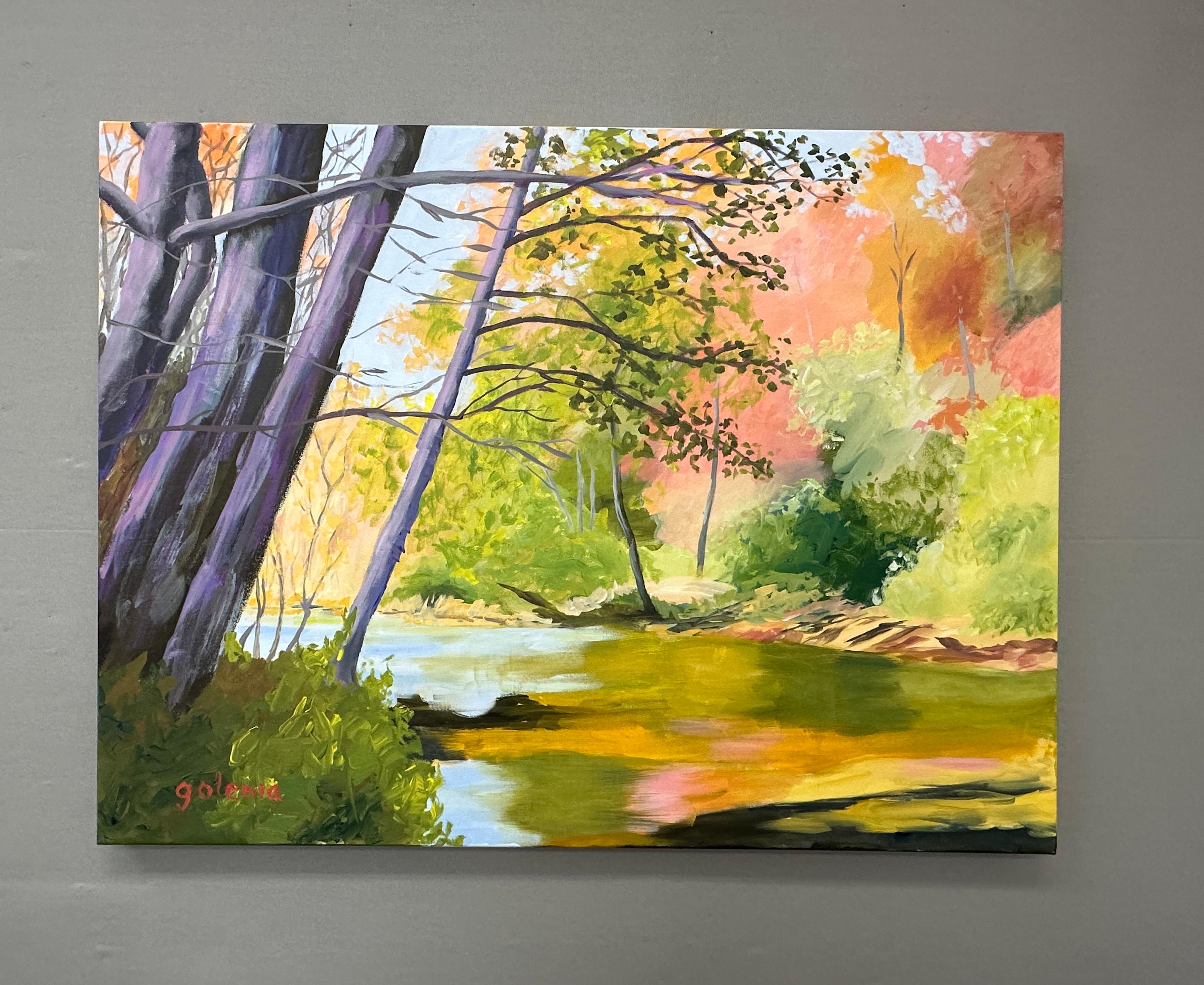 <p>Artist Comments<br>Early morning sunlight brings out the soft colors of fall. Riverside trees cast a soothing shadow onto the water that reflects their vibrant hues. The stillness of the surroundings evokes a sense of