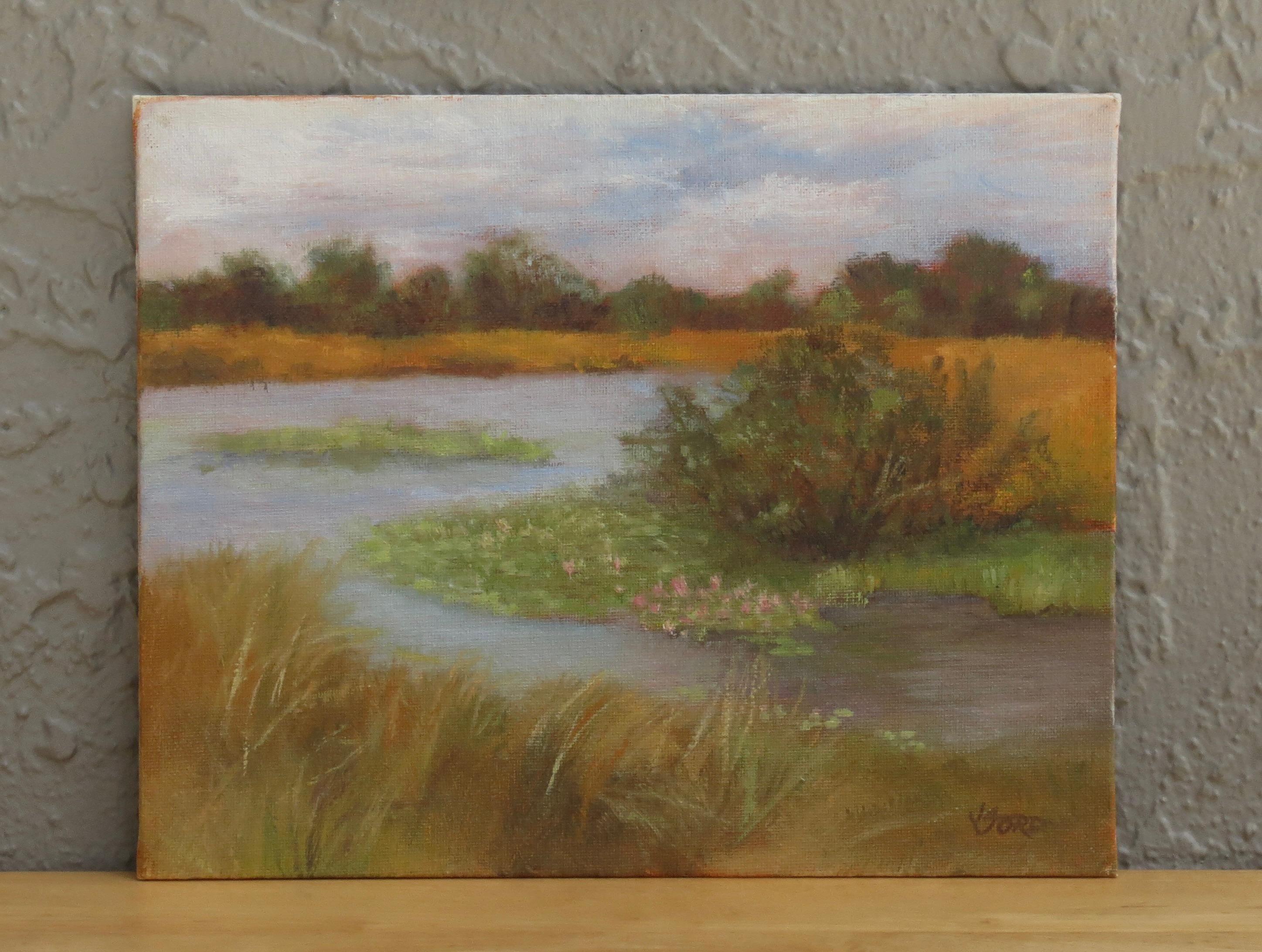 <p>Artist Comments<br />Soft hues of green and brown blend together in a serene wetland scene. Lilies float gently on the calm river, while clusters of bushes and grasses thrive along the water's edge. Trees stretch across the distant horizon