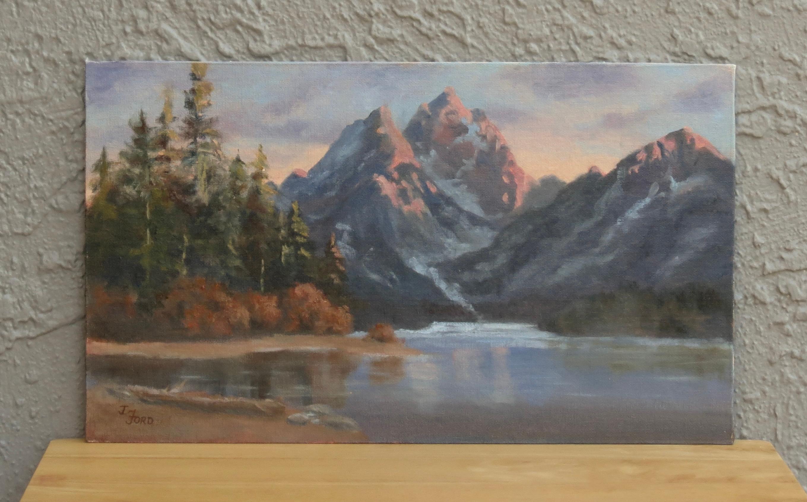 <p>Artist Comments<br />Warm light from the rising sun bathes the rugged peaks of the Grand Tetons in soft pink and orange hues. The mountain range towers over Jenny Lake while tall evergreens line the shore. Artist Joanie Ford loves all kinds of