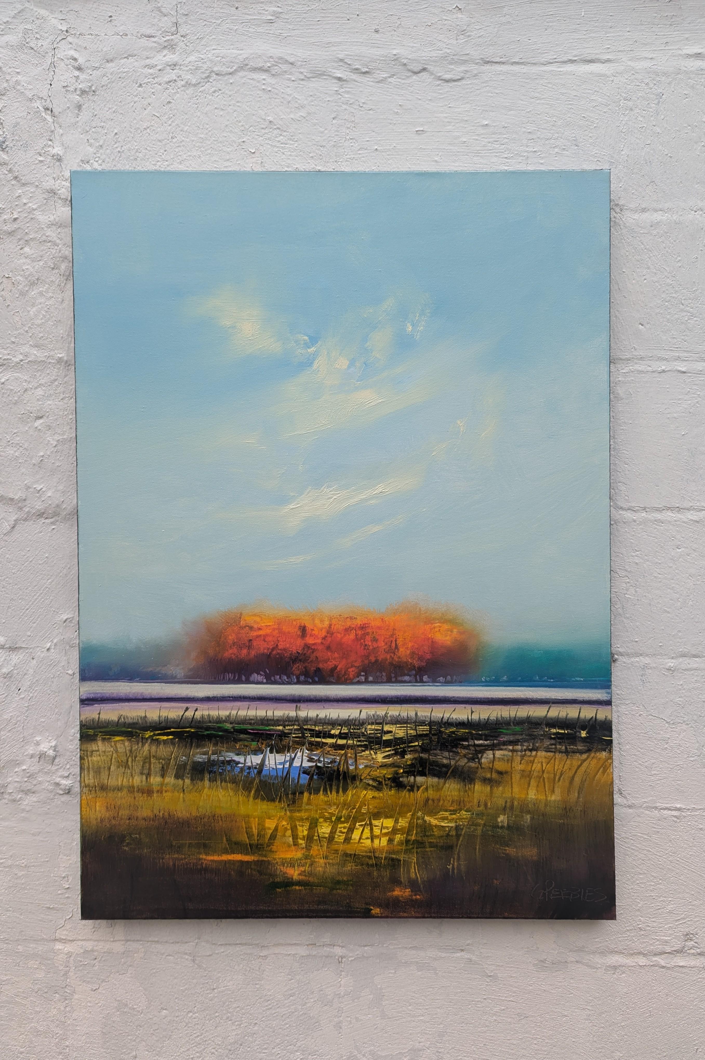 <p>Commenti dell'artista<br />Un gruppo di alberi di un vibrante colore arancione si erge sotto un cielo ampio e spazzolato da delicate nuvole bianche. In primo piano, un campo d'erba con macchie d'acqua riflettenti crea un tranquillo spettacolo di