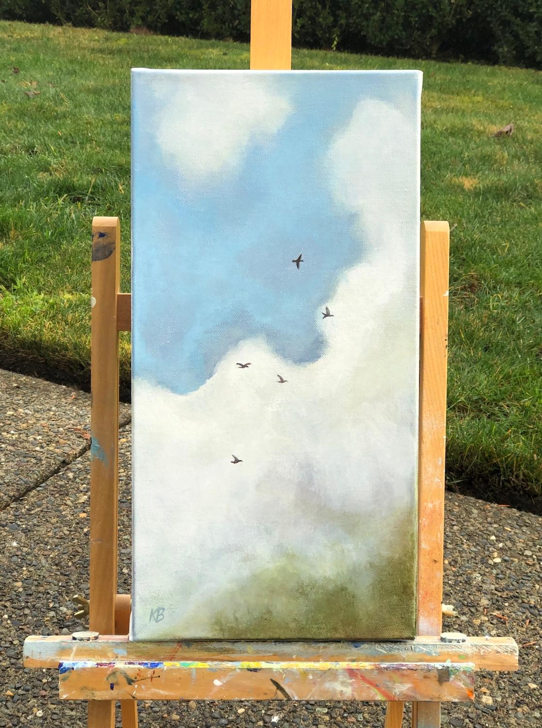 <p>Commentaires de l'artiste<br />De doux nuages se mêlent à un ciel d'un bleu éclatant, où cinq oiseaux s'élèvent dans une atmosphère sereine. La scène s'inspire de l'observation par l'artiste Karen Barton de ces délicates créatures venant se poser