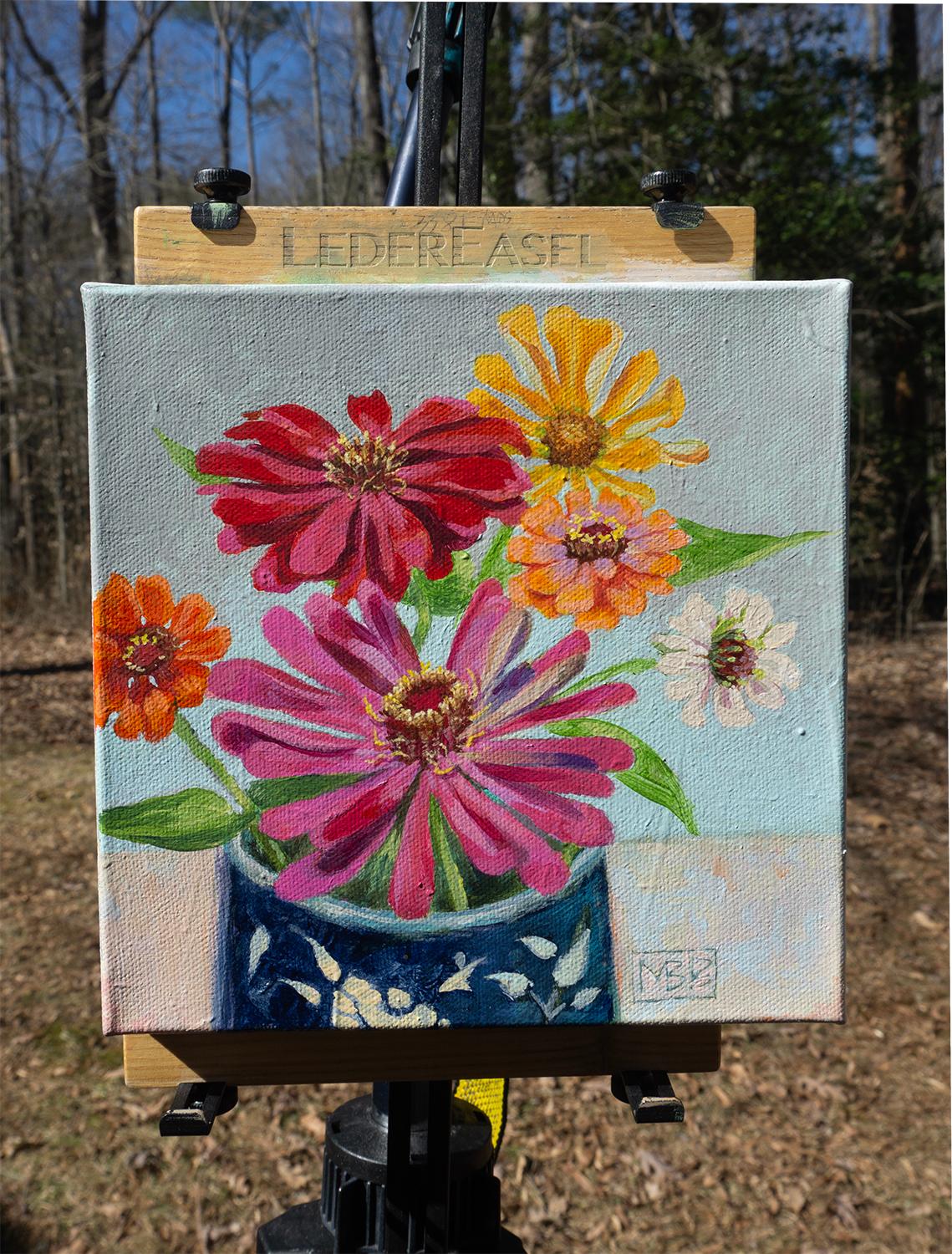 <p>Artist Comments<br>Colorful zinnias fill a bright blue mug, each bloom depicted with loose strokes. The vibrant palette and relaxed brushwork create a lively, fresh atmosphere. Artist Mary Beatty-Brooks modeled the composition after her grown
