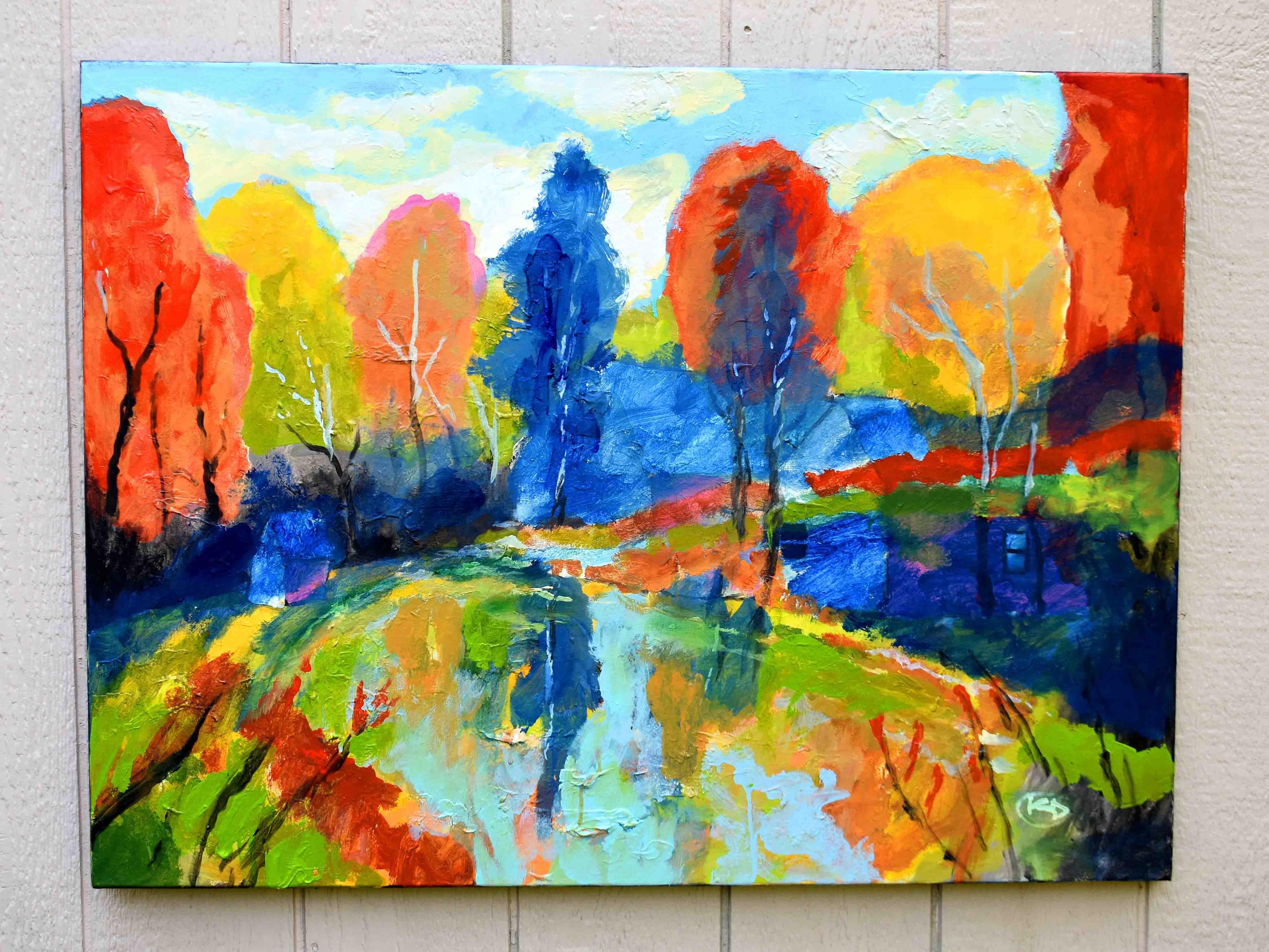<p>Commentaires de l'artiste<br />Une forêt vibrante s'ouvre pour révéler un étang caché, sa surface immobile reflétant les couleurs brillantes des arbres. Des éclats d'orange, de vert, de bleu et de jaune dansent à travers le paysage, avec de