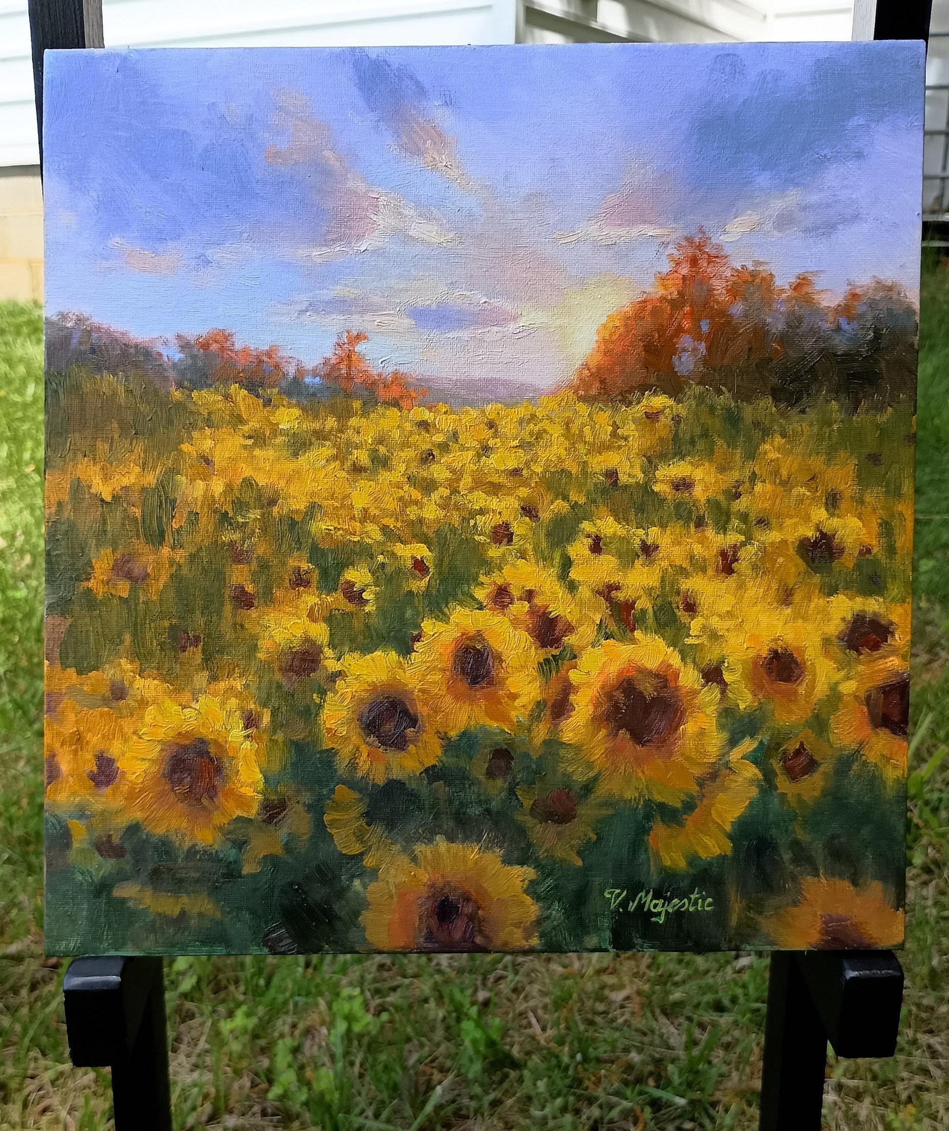 <p>Artist Comments<br>A vast field of sunflowers stretches toward the horizon beneath a vibrant sky. Their golden heads glow in the setting sun as the warm light bathes the scene with serenity. Impressionistic strokes capture movement and a sense of