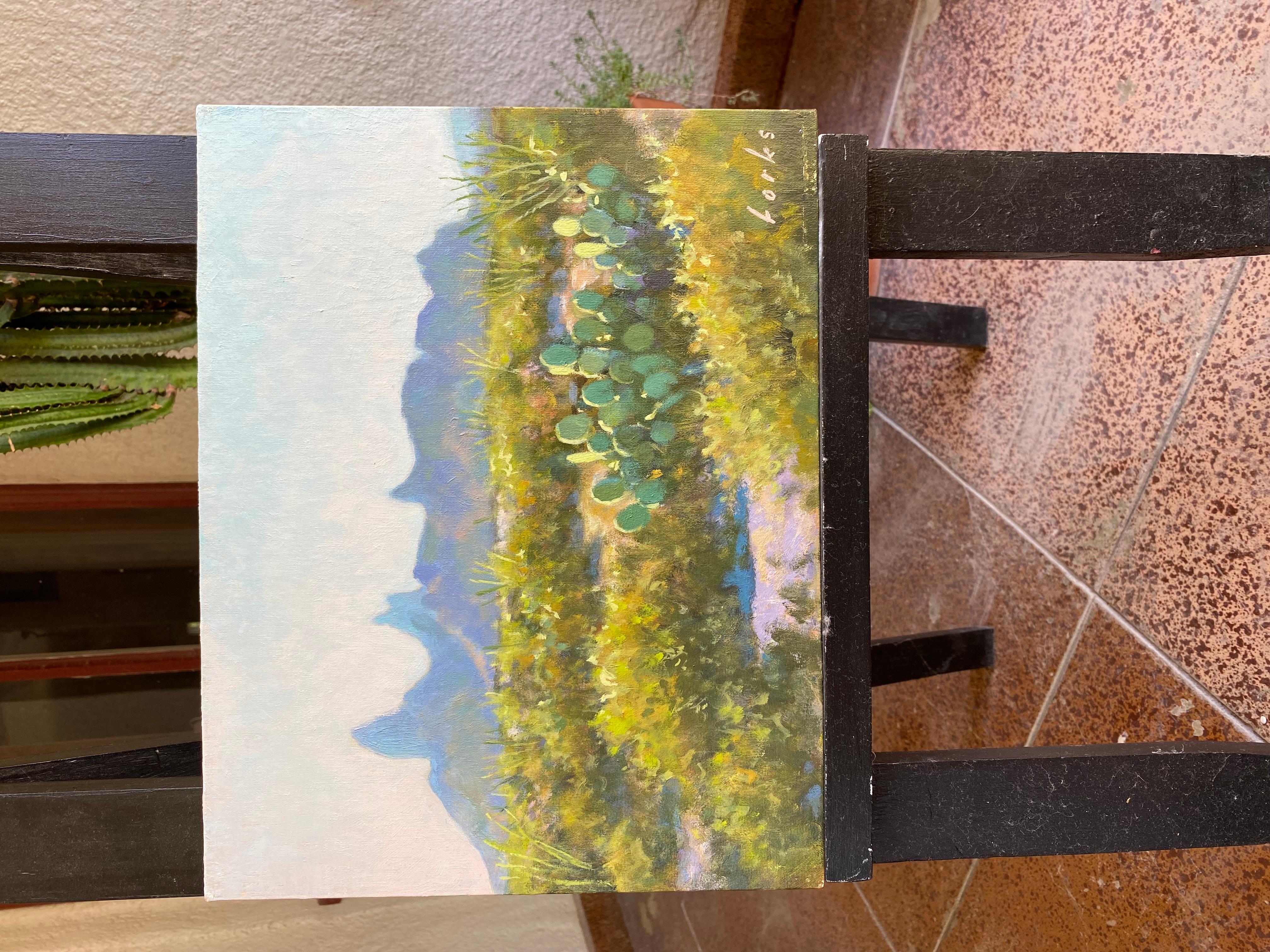 <p>Artist Comments<br>Warm morning light bathes the desert of Big Bend National Park, casting a golden glow over the landscape. The iconic Mule Ear Peaks rise prominently from the desert floor in the distance. In the foreground, lush greenery,