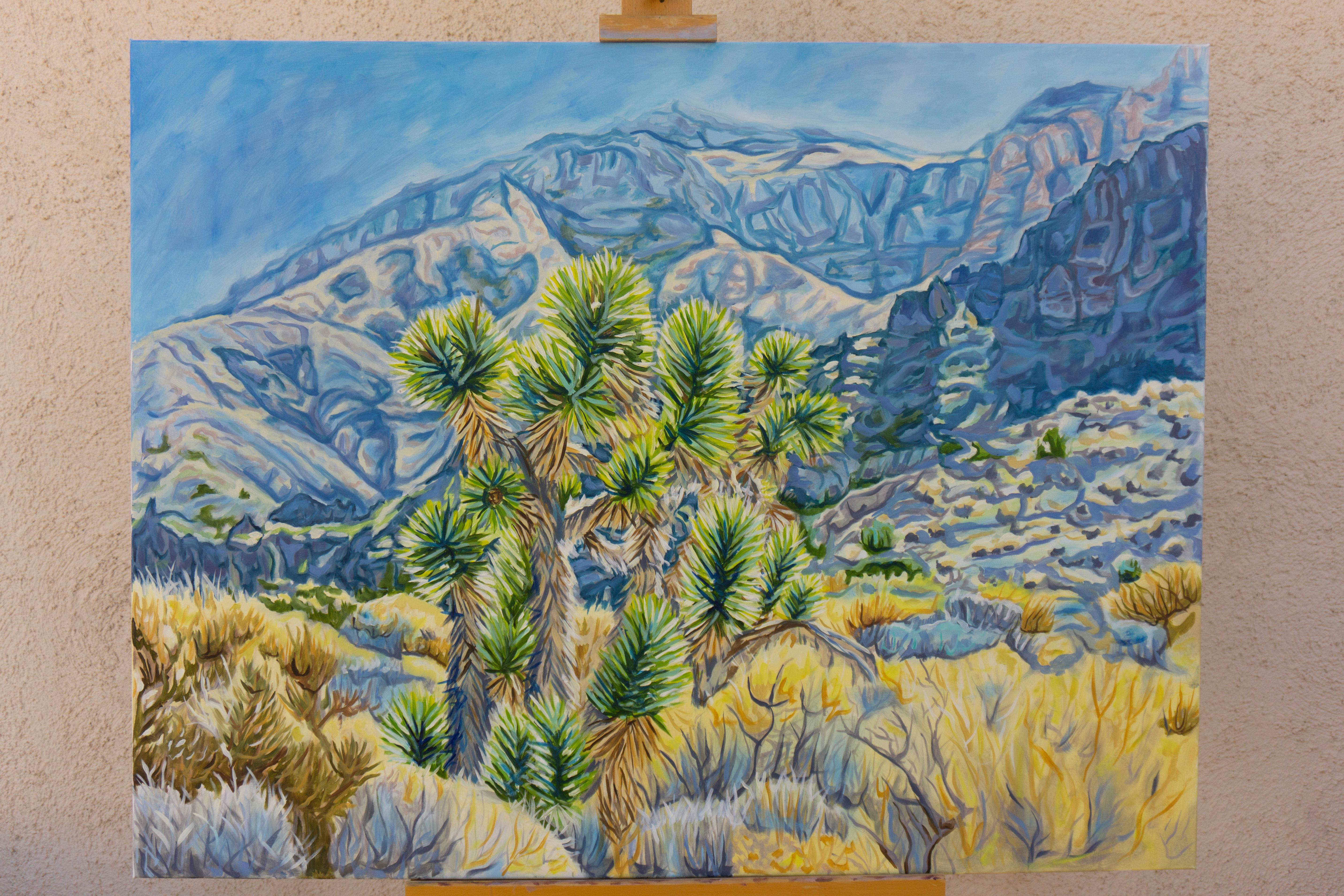 <p>Artist Comments<br>A Joshua tree stands among yellow desert bushes, its leaves appearing to glow under the bright sun. In the distance, a blue ridge and a mountain rise. Rugged forms and saturated colors capture the essence of the