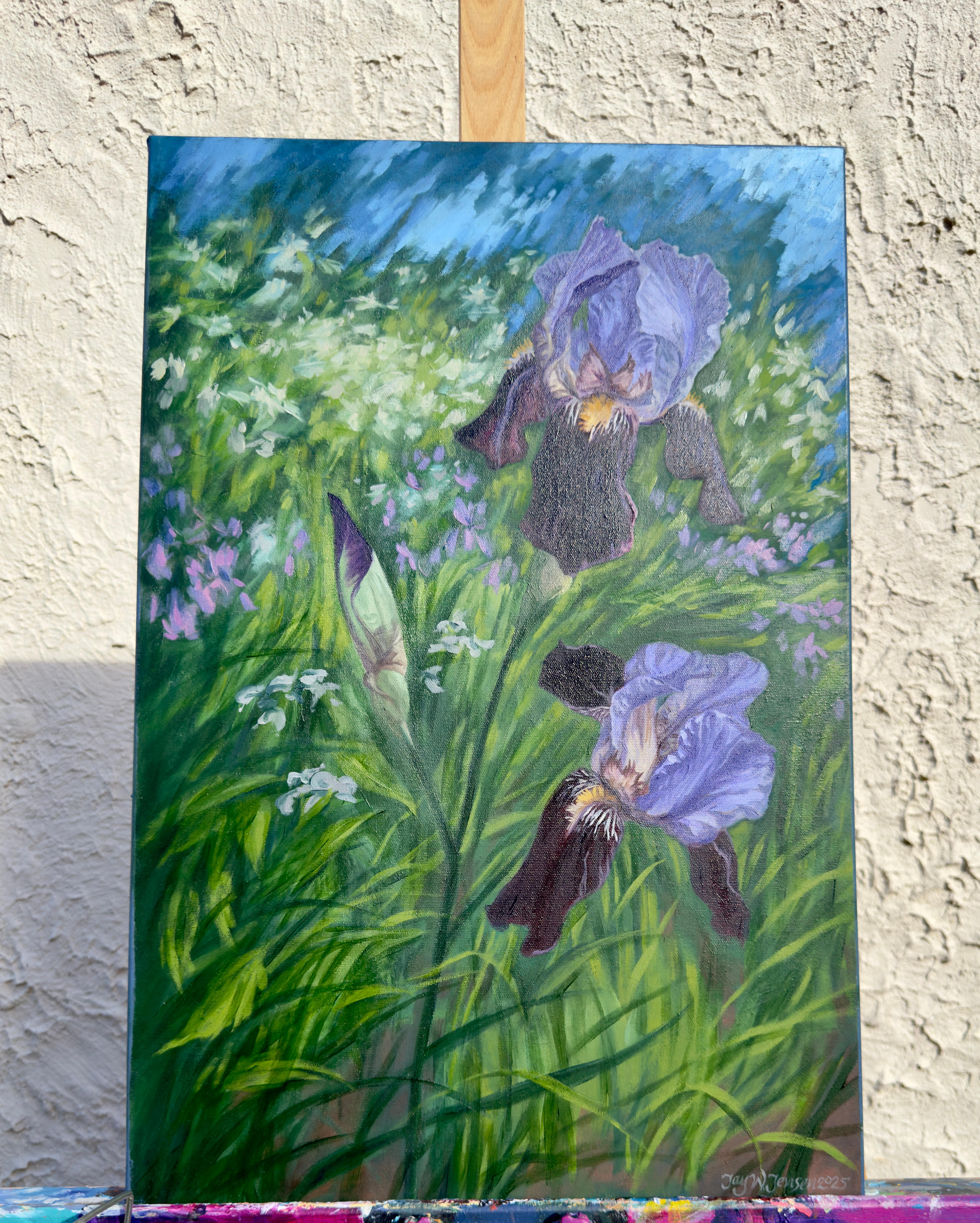 <p>Artist Comments<br>Iris flowers sway among the grass in a sun-dappled landscape. Their petals reveal subtle shifts in color, from soft greyish purples to deep burgundy tones. Hints of amber at their interior create a striking complementary