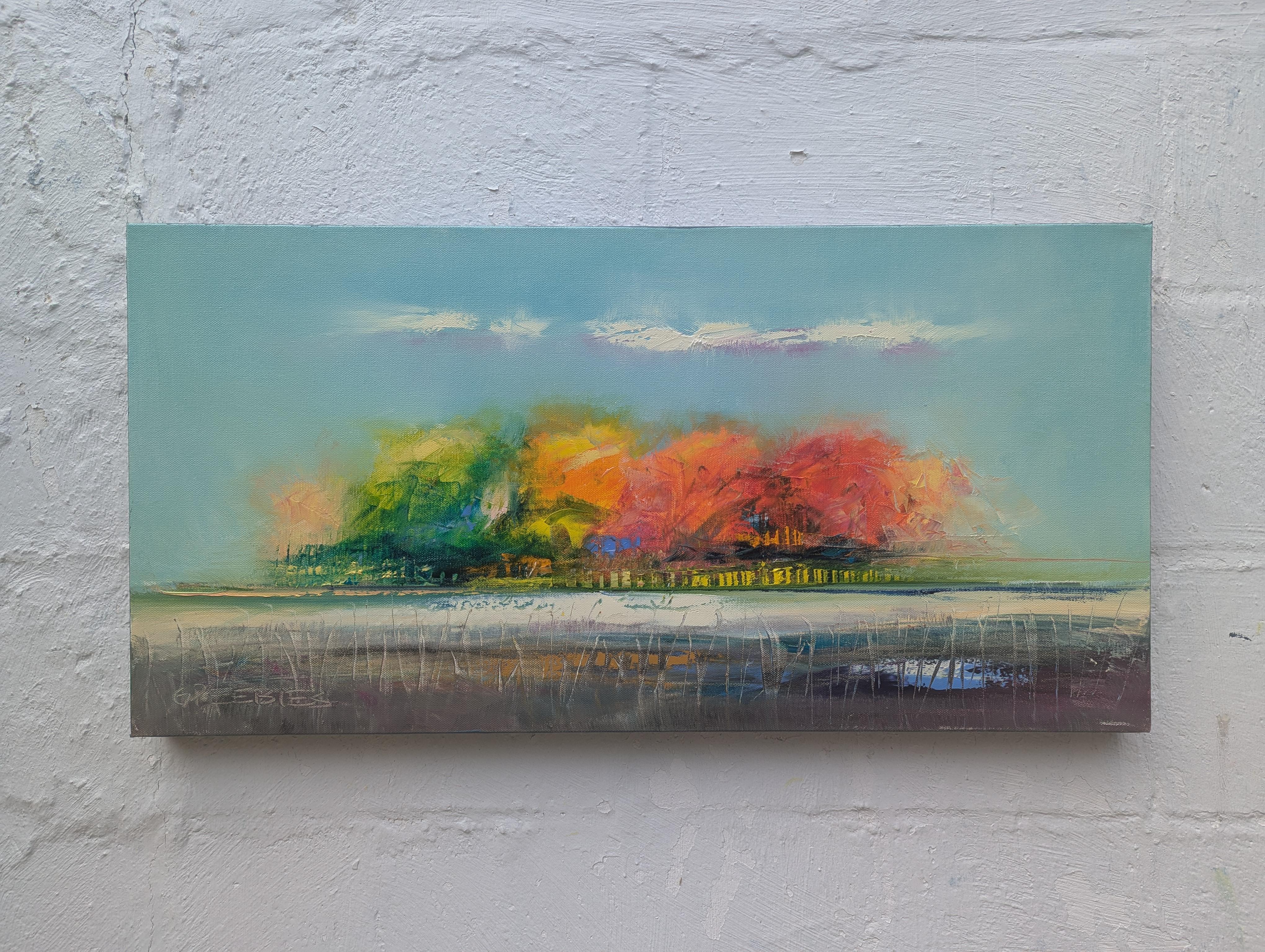 <p>Commentaires de l'artiste<br>Les feuilles rouges, orange et dorées jaillissent des arbres tandis que les nuages dérivent paresseusement au-dessus d'eux. Les doux reflets du ciel scintillent sur le sol, capturant la beauté tranquille de la saison.