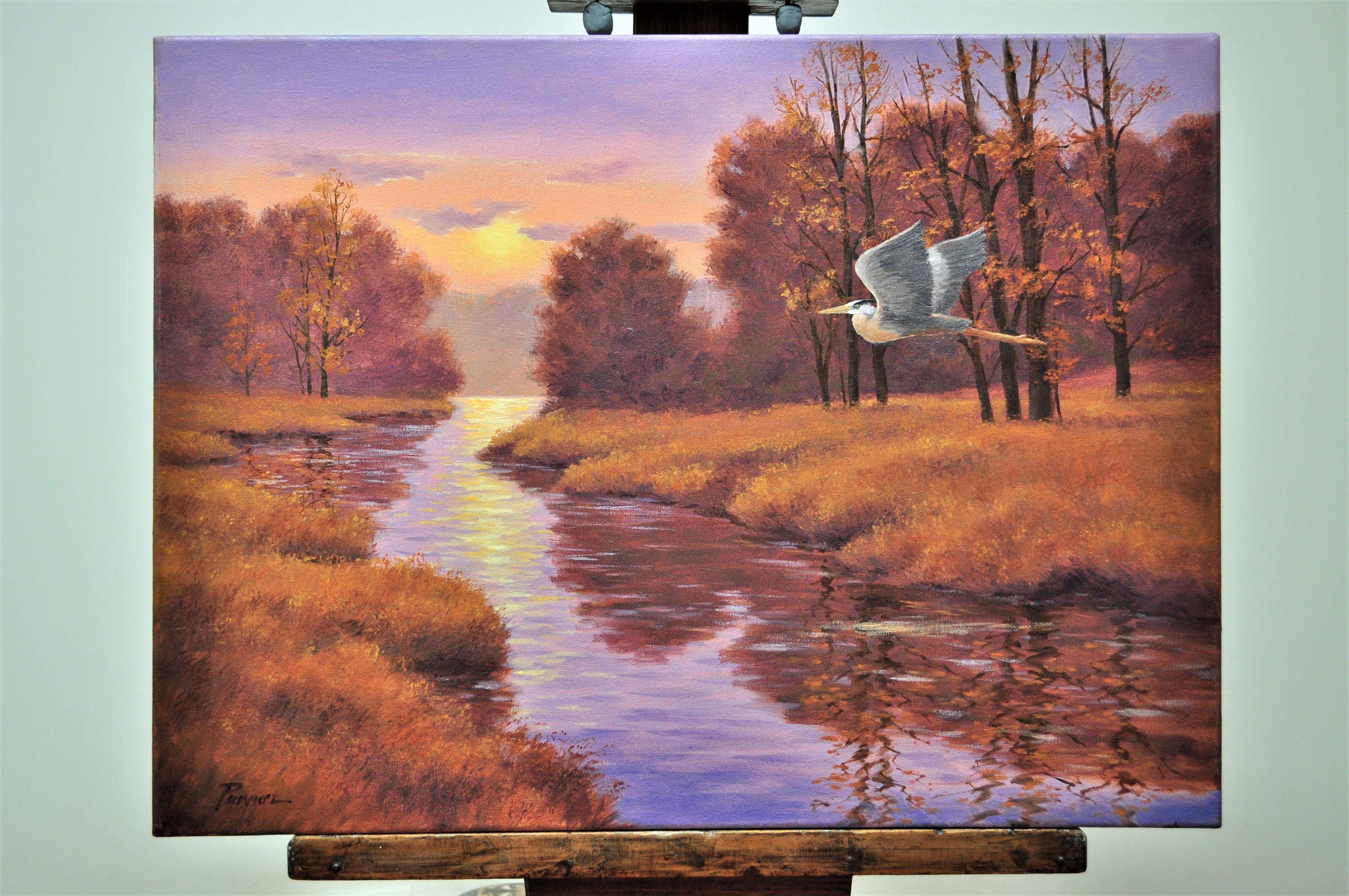 <p>Artist Comments<br>Evening when the sun glows on the river is a special time that gives me hope for life and living.  The blue heron glides along in its own peaceful world.  This painting was done with glazes of oil paint and textured with a