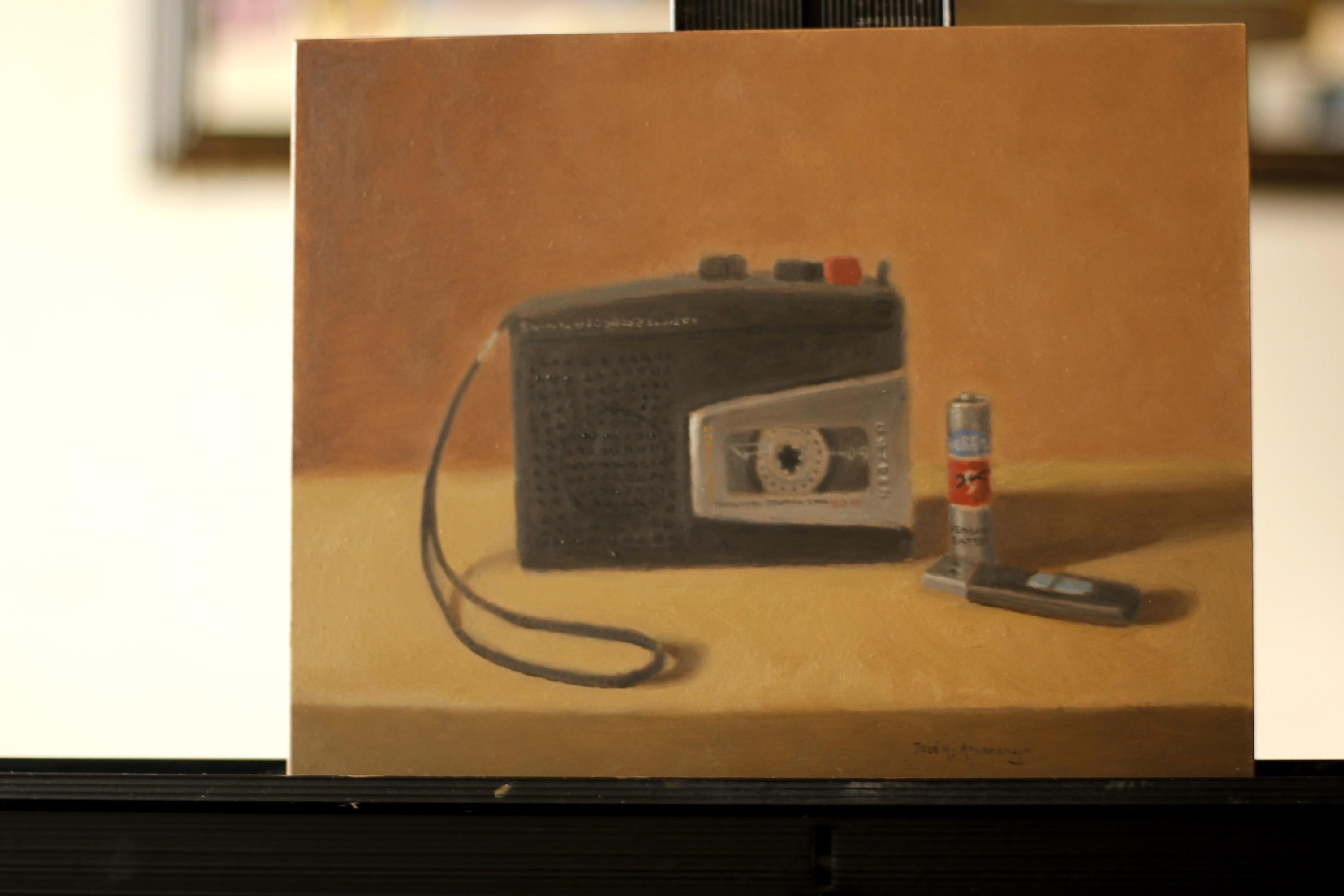 <p>Artist Comments<br />In this piece, I wanted to represent the past and present of technology, juxtaposing the vintage voice recorder and the more modern USB flash drive. On the voice recorder I changed the brand name to Rotceh, which is my middle