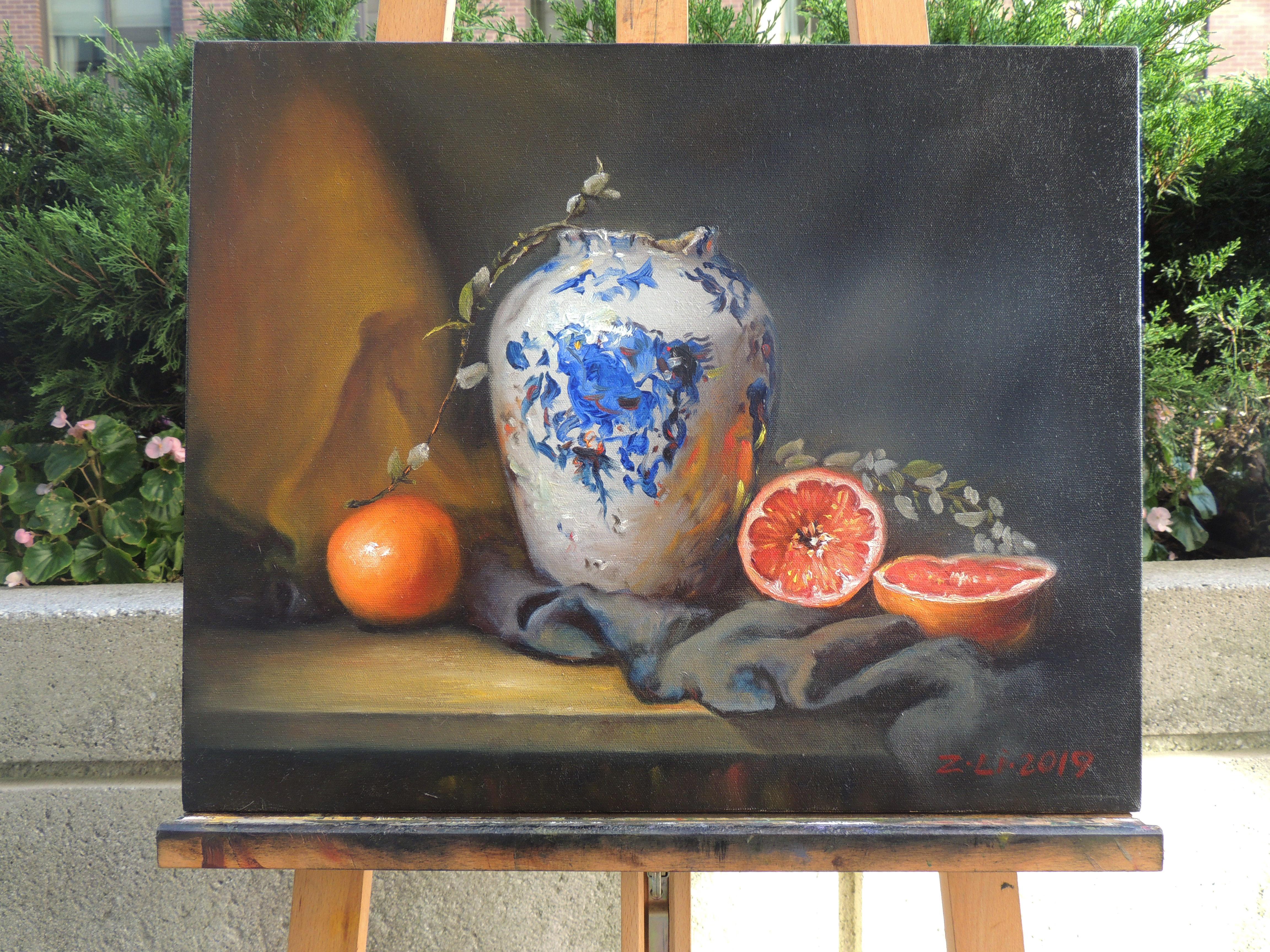 <p>Artist Comments<br />Winter still life with Chinese vase, grapefruit, freshly cut branches and drapery on a wood table. The bright orange and red of the citrus stand out on the muted blue gray cloth. Soft light from the left reflects on the skin