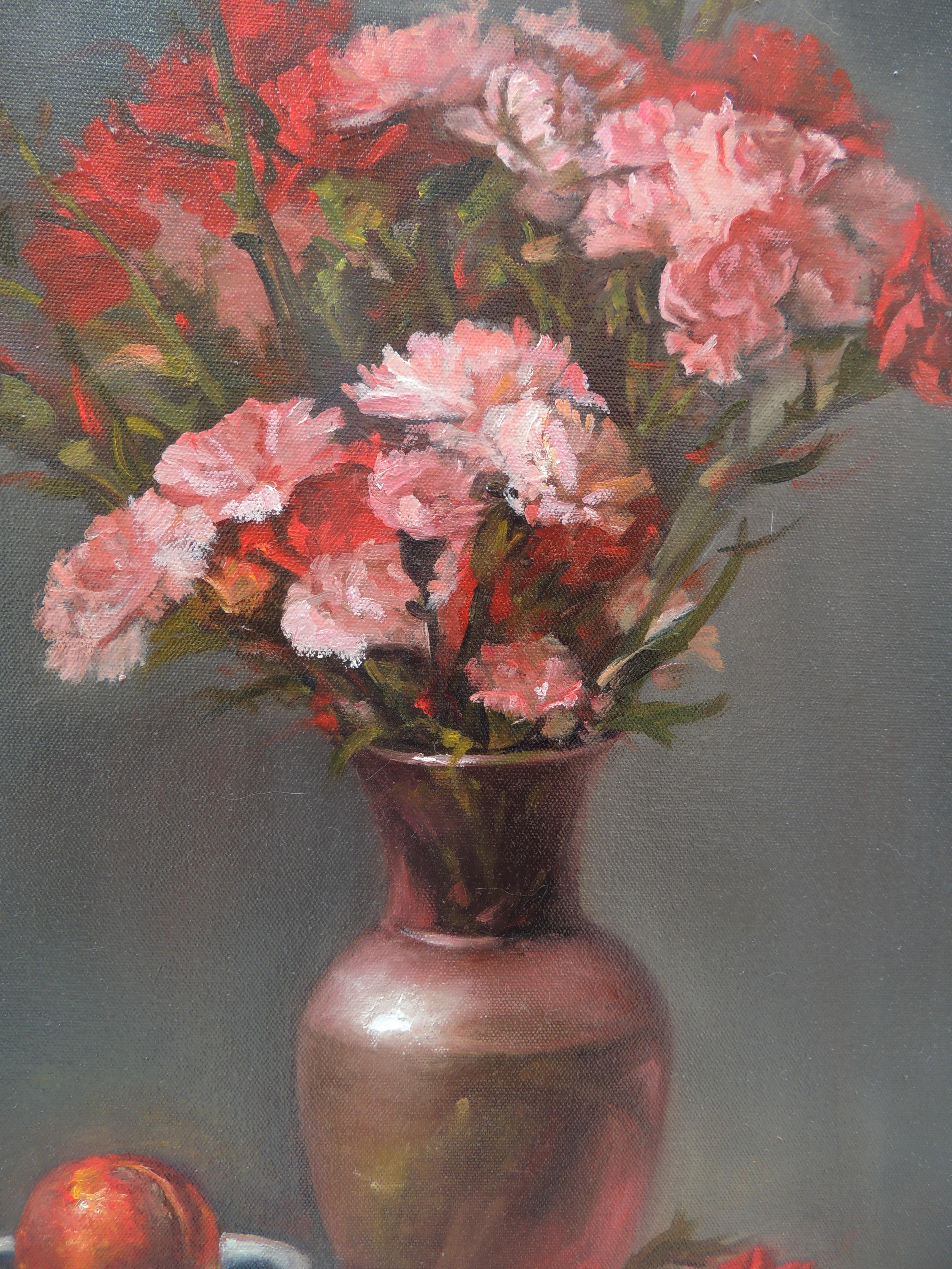 <p>Artist Comments<br />Delicate pink and red carnations in a translucent pink vase on dark grey. Zhi conceived this scene as a backward curving 'C' design, with a special emphasis on the closest flowers. The light shines from the left, gently