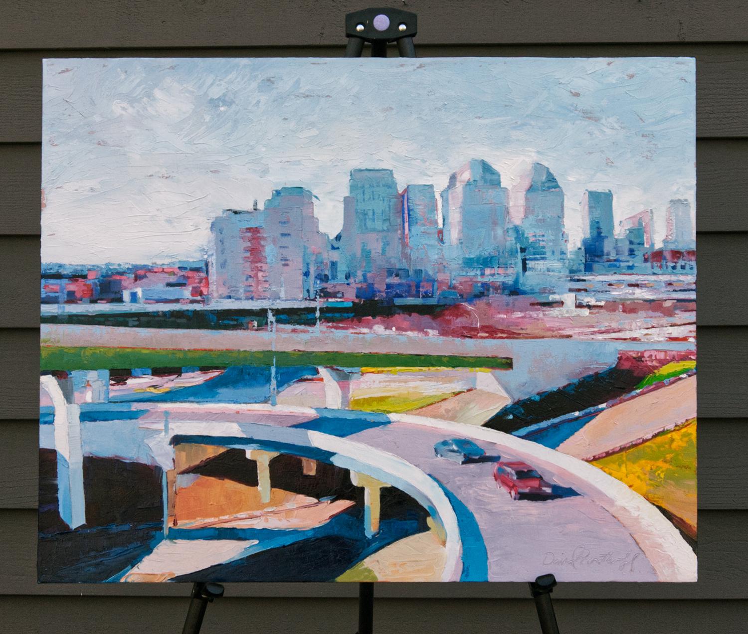 <p>Artist Comments<br />A modernist view of Cincinnati captured in blocky shades of blue, green and red with accents of yellow and orange. 
