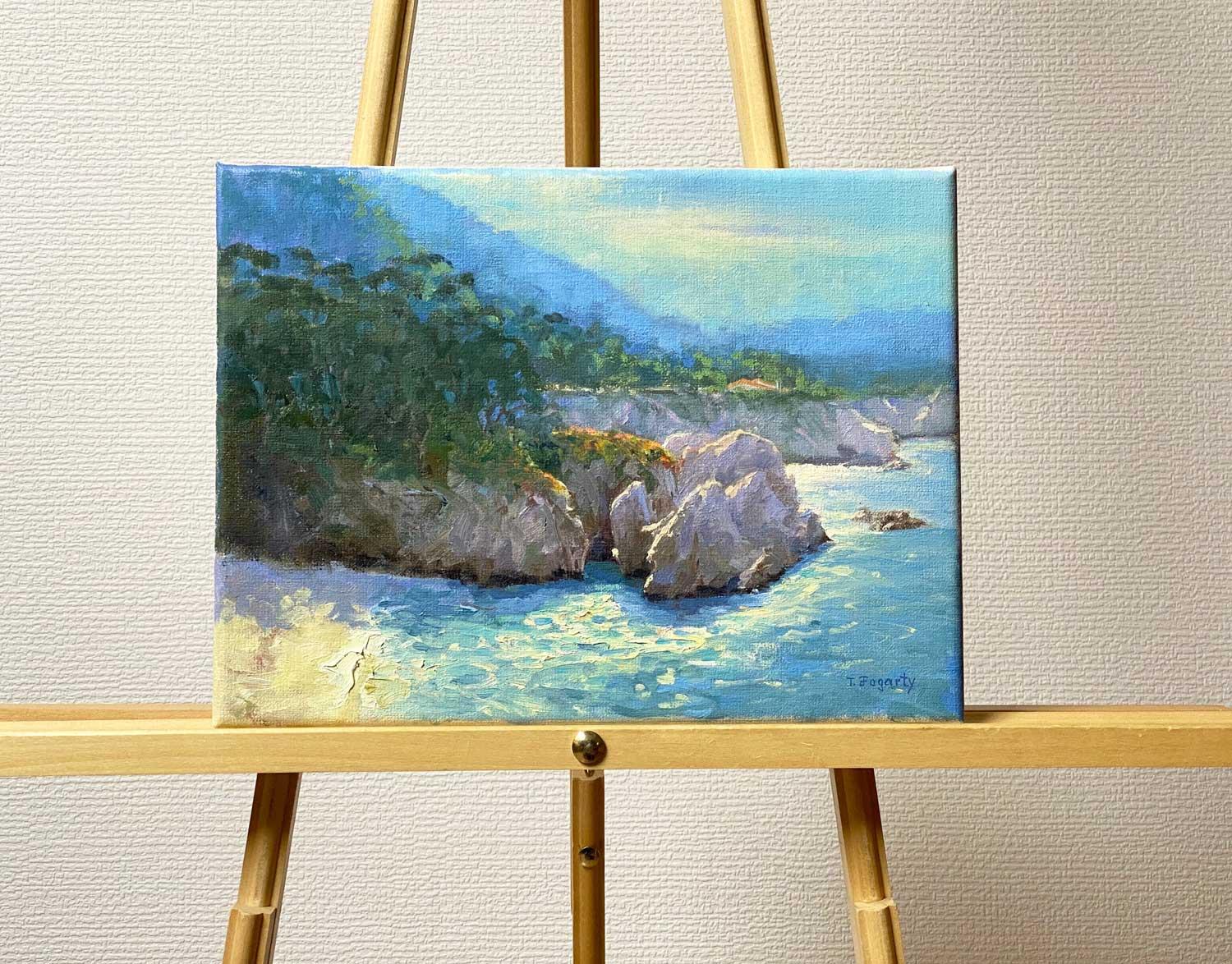 <p>Artist Comments<br />Tatyana was inspired by the shimmering water, reflections and shadowed cliffs surrounding Gibson Beach in Point Lobos, near Carmel, CA. Late afternoon sun peeks through the gently overcast sky, lighting up the landscape. 
