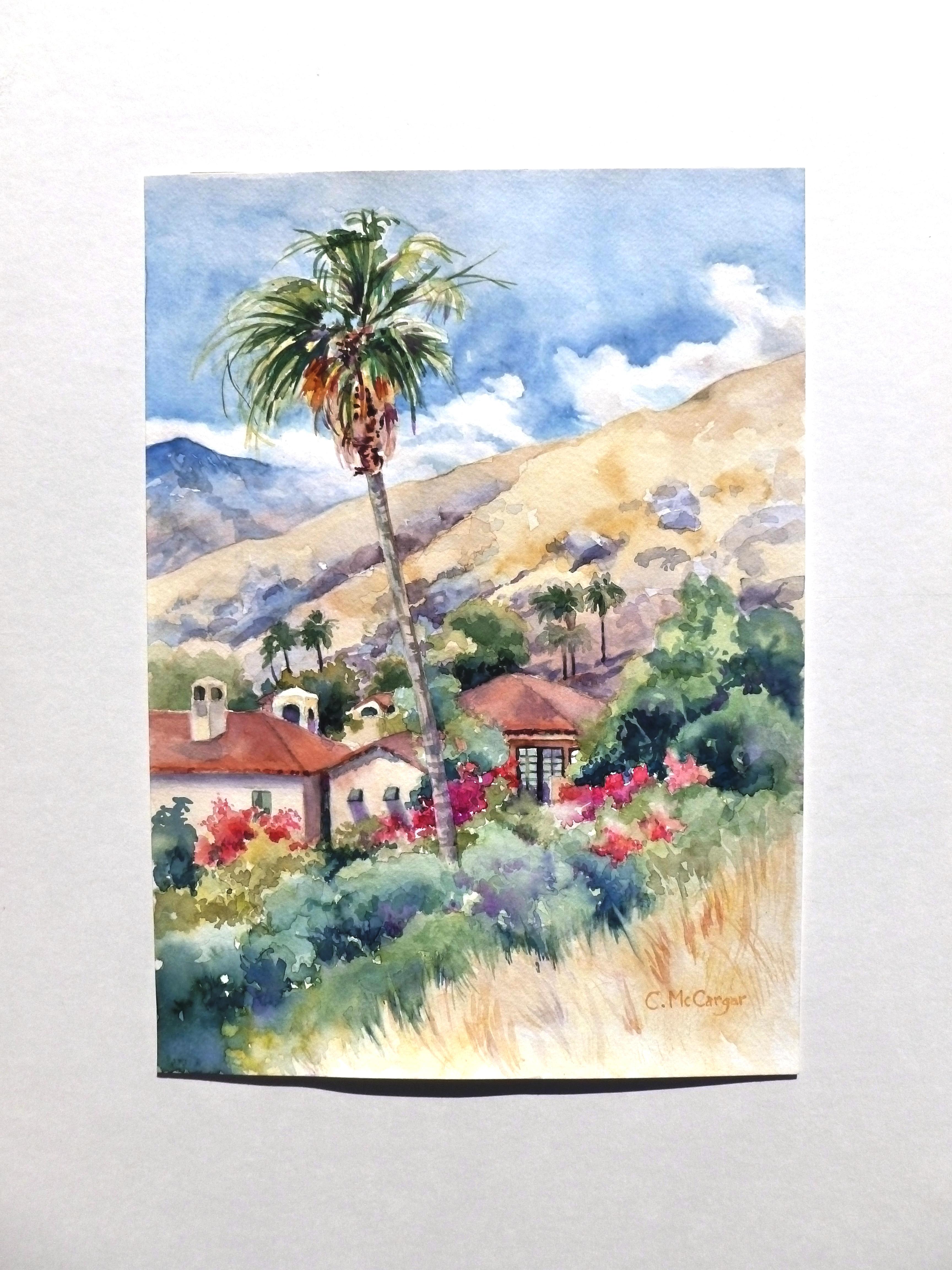 <p>Kommentare des Künstlers<br>Eine Gruppe von einladenden Häusern im mediterranen Stil in Palm Springs, eingebettet in eine Kulisse von felsigen Wüstenhügeln und bewacht von einer Wächterpalme. 