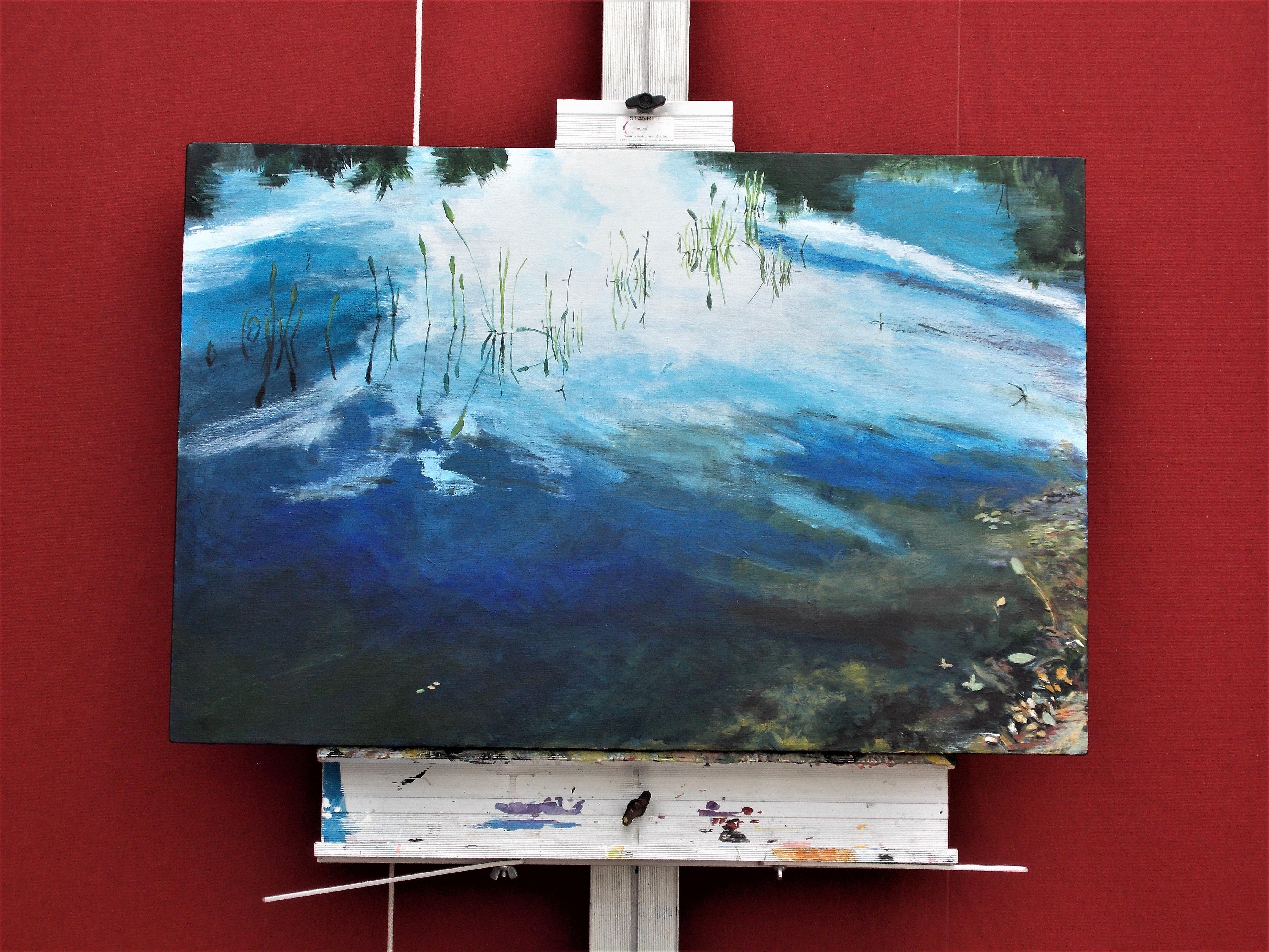 <p>Artist Comments<br>A luminous view of a pond capturing the gentle ripple of the water. Slender blades of grass emerge, casting reflections on the surface. When asked about his process, artist Benjamin Thomas explained the labor intensive work