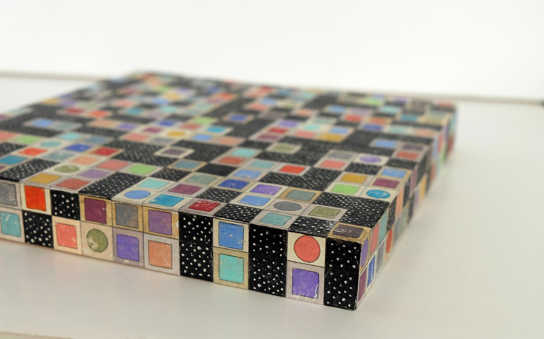 <p>Artist Comments<br>A geometric composition with two sets of patterned squares dispersed on a grid by artist Terri Bell. 