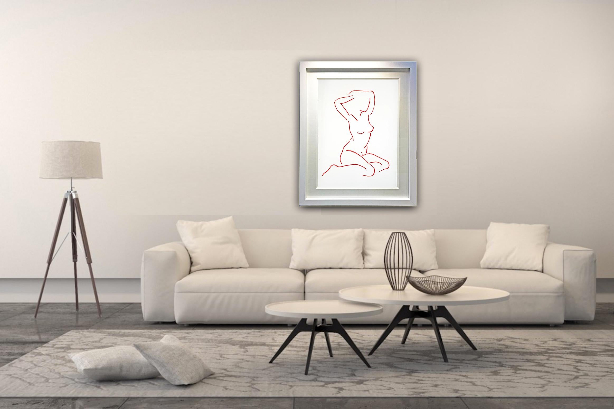 Beautiful red drawing from a live model framed in a white wood frame with a linen mount.
Elegant artwork