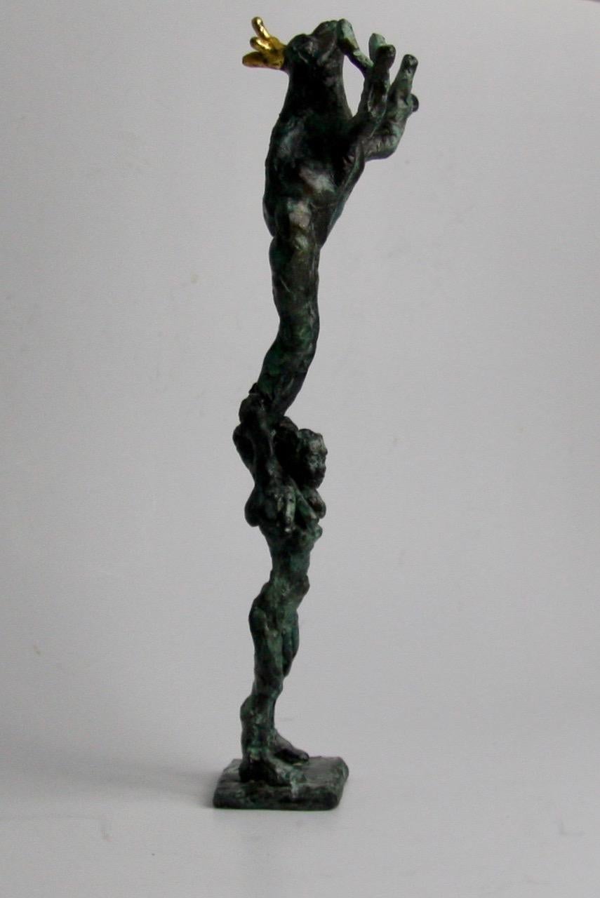Frog Acrobatics by Helle Crawford, Bronze sculpture of a frog carried by a woman