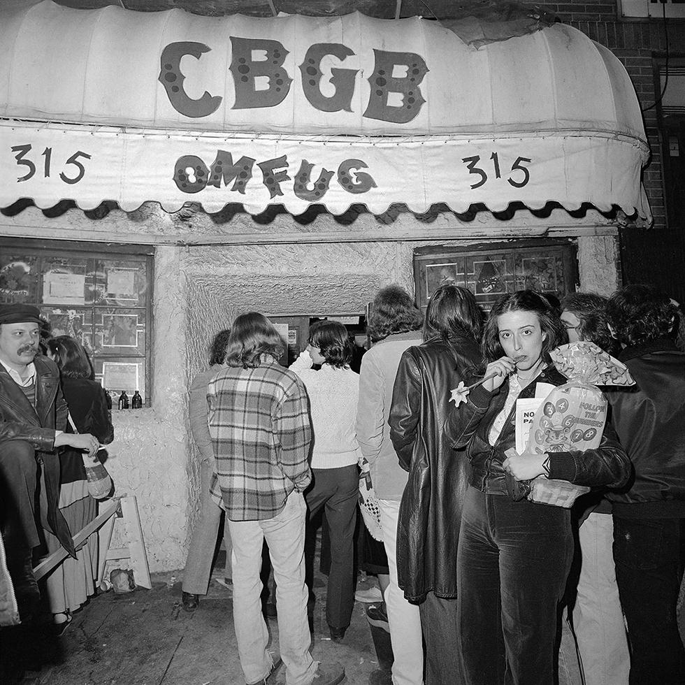 Meryl Meisler Black and White Photograph - A Flower Outside CBGB OMFUG