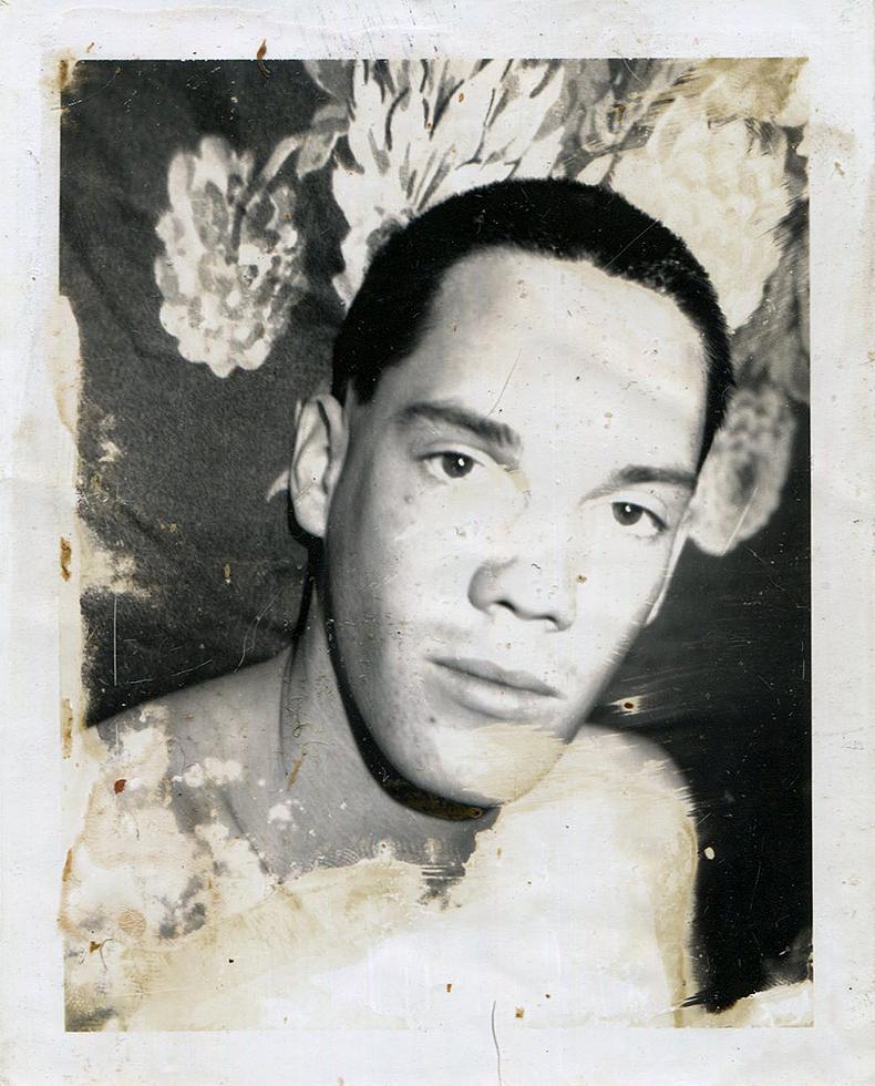 Mark Morrisroe Portrait Photograph - Untitled (Close Up of Robert in Front of Floral Fabric)