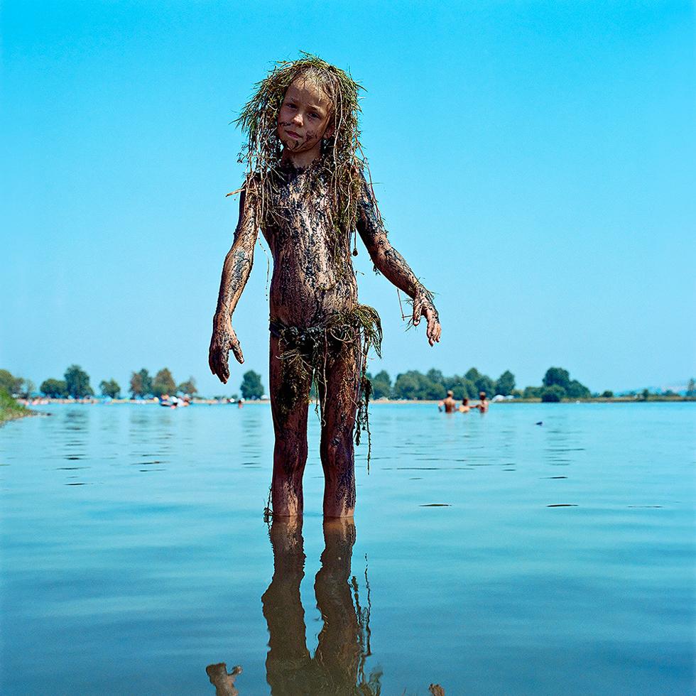 Evžen Sobek Portrait Photograph - Untitled (Girl Covered with Grass)