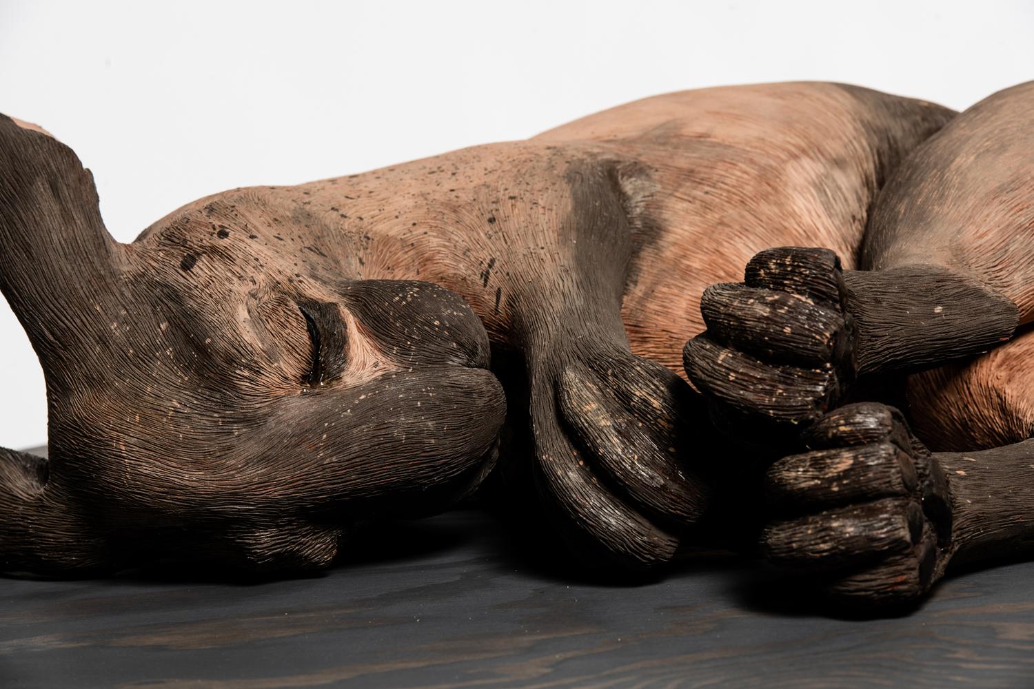 Back to Earth - Black Figurative Sculpture by Margit Brundin