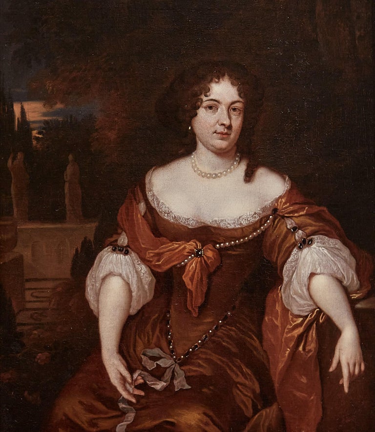 Portrait of a lady, seated on an ornamental garden terrace, wearing a russet coloured dress adorned with pearls and jewels, by Caspar Netscher, c.1680.

Oil on canvas in a burnished giltwood period frame.

Dimensions: 62 x 52cm, (24 1/2 x 20 1/2