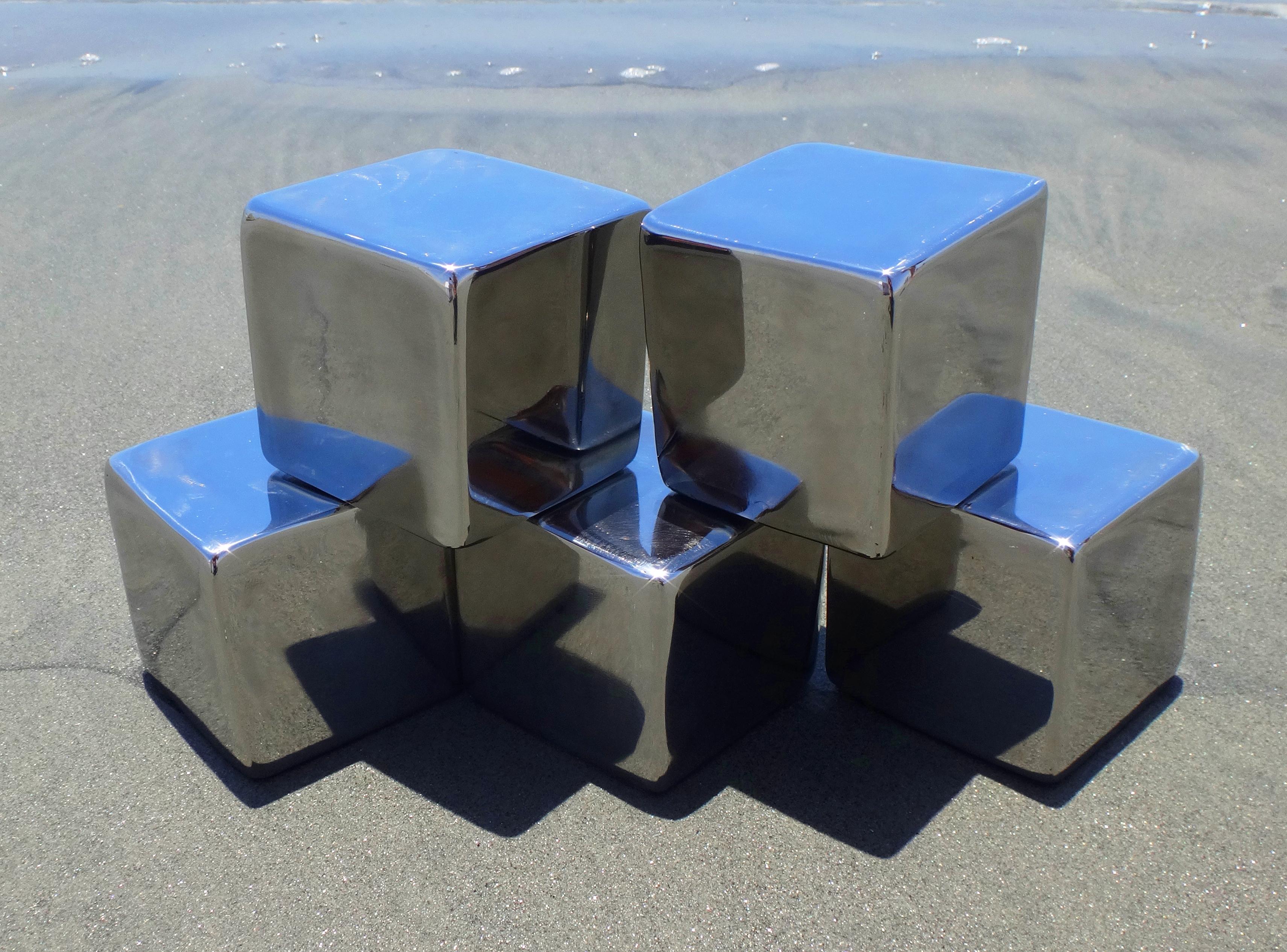 Formless is a project that attempts to replicate the logic of color, which is that color only exists because of and upon a background. Each cube is TIG welded from stainless steel and polished to a mirror finish. The cubes are then documented in
