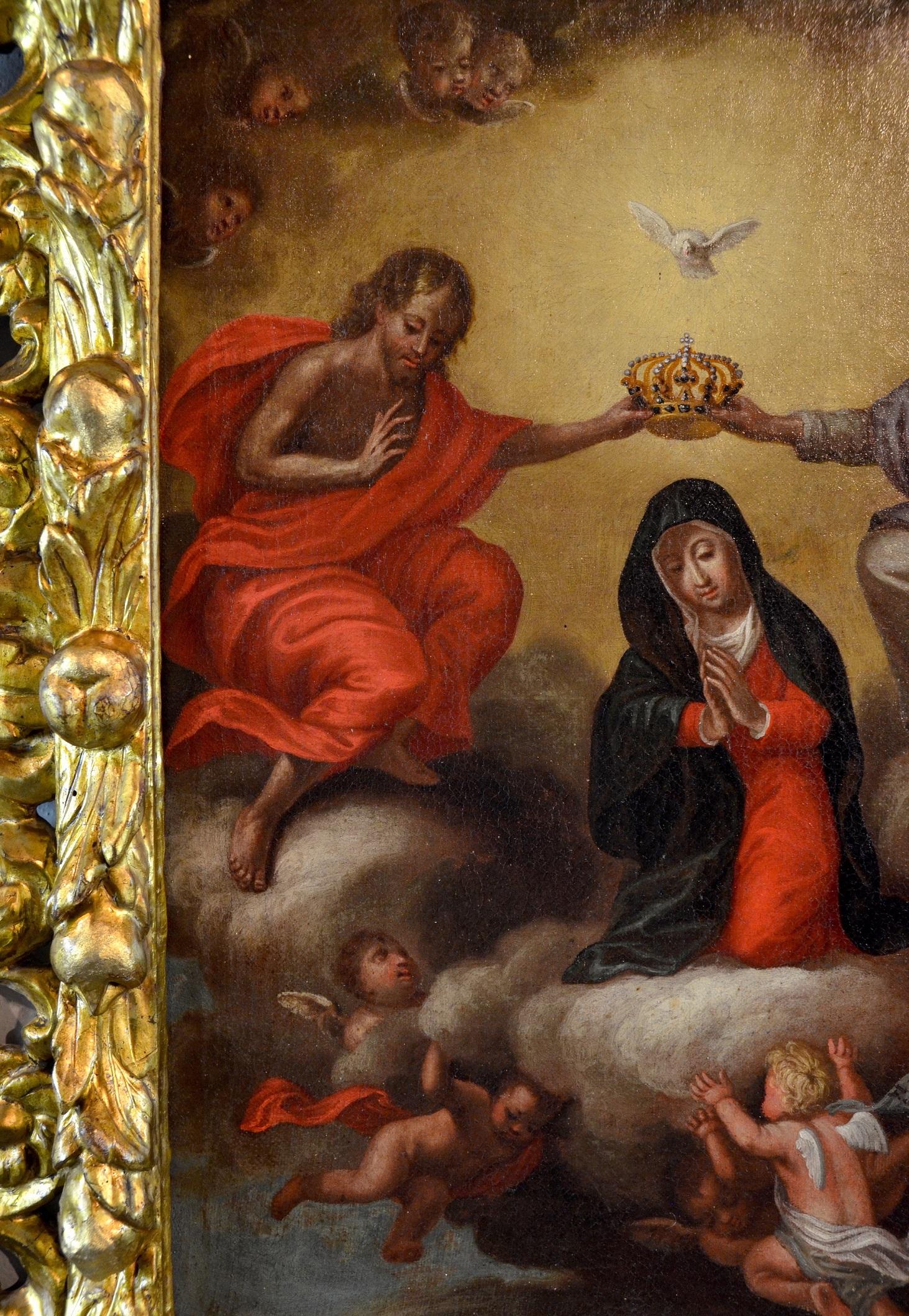 This jewel of the early seventeenth century in Emilia destined for private devotion, and enriched by a superb coeval frame in carved and gilded wood, presents the theme of the coronation of the Virgin. This type of iconography sees at the center the