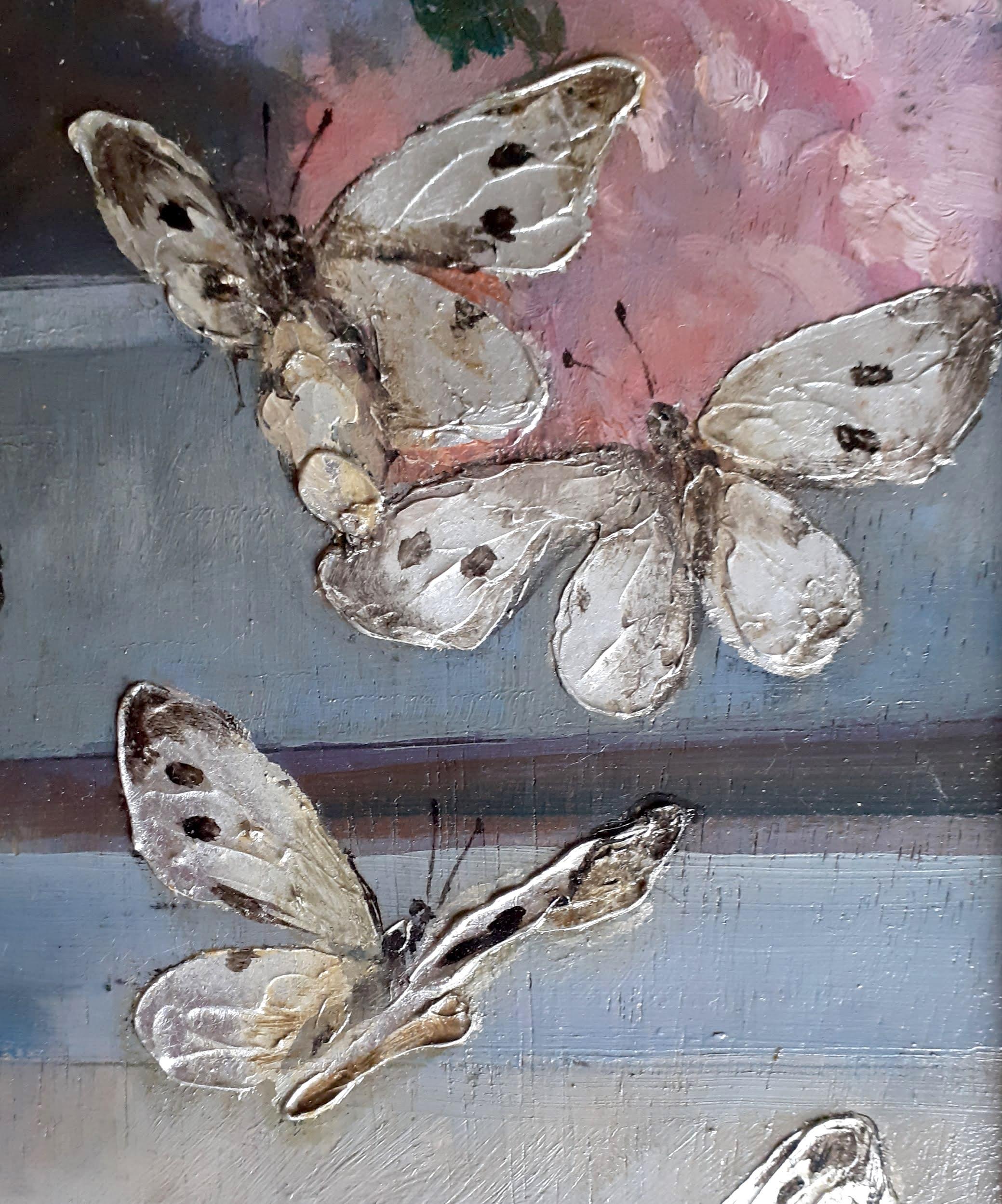 A joyful and etherial floral still life depicting a bouquet of flowers in a vase on a window sill - surrounded by a host of silver butterflies! The butterfly wings shimmer in actual silver, making the artwork a lovely example of the French arts and