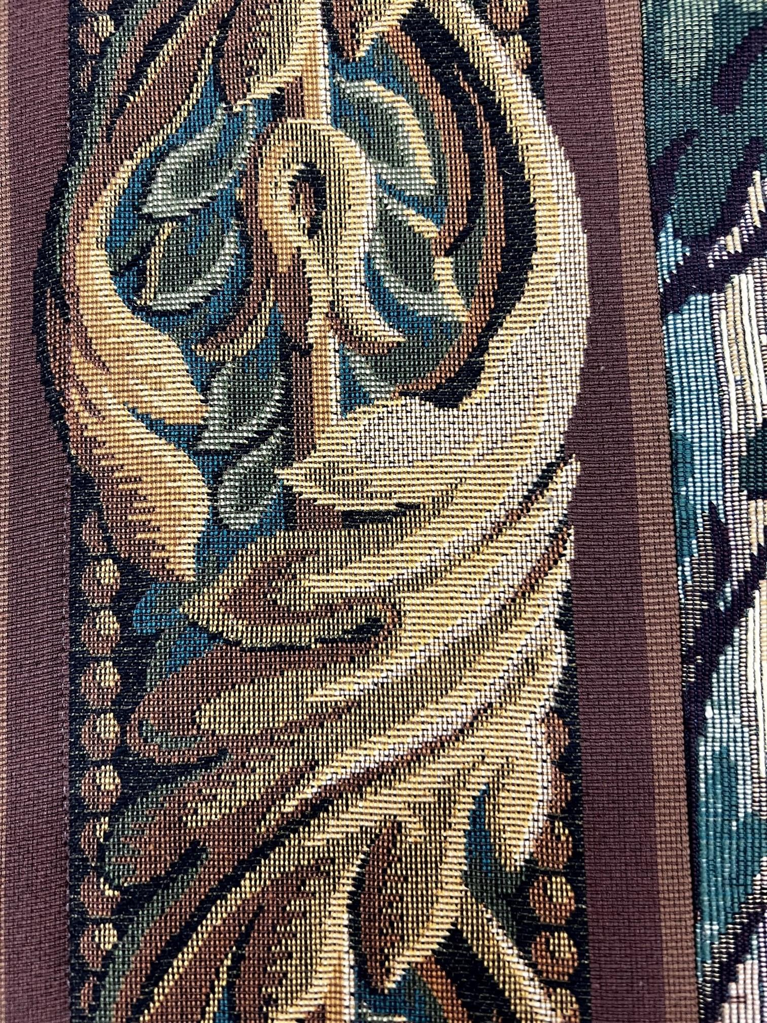 In the 18th Century, landscapes with trees, birds and rivers were popular, and often included architectural features such as the castle in the background of this scene.

This tapestry is French made,  Jacquard woven with relief stitch. It is fully