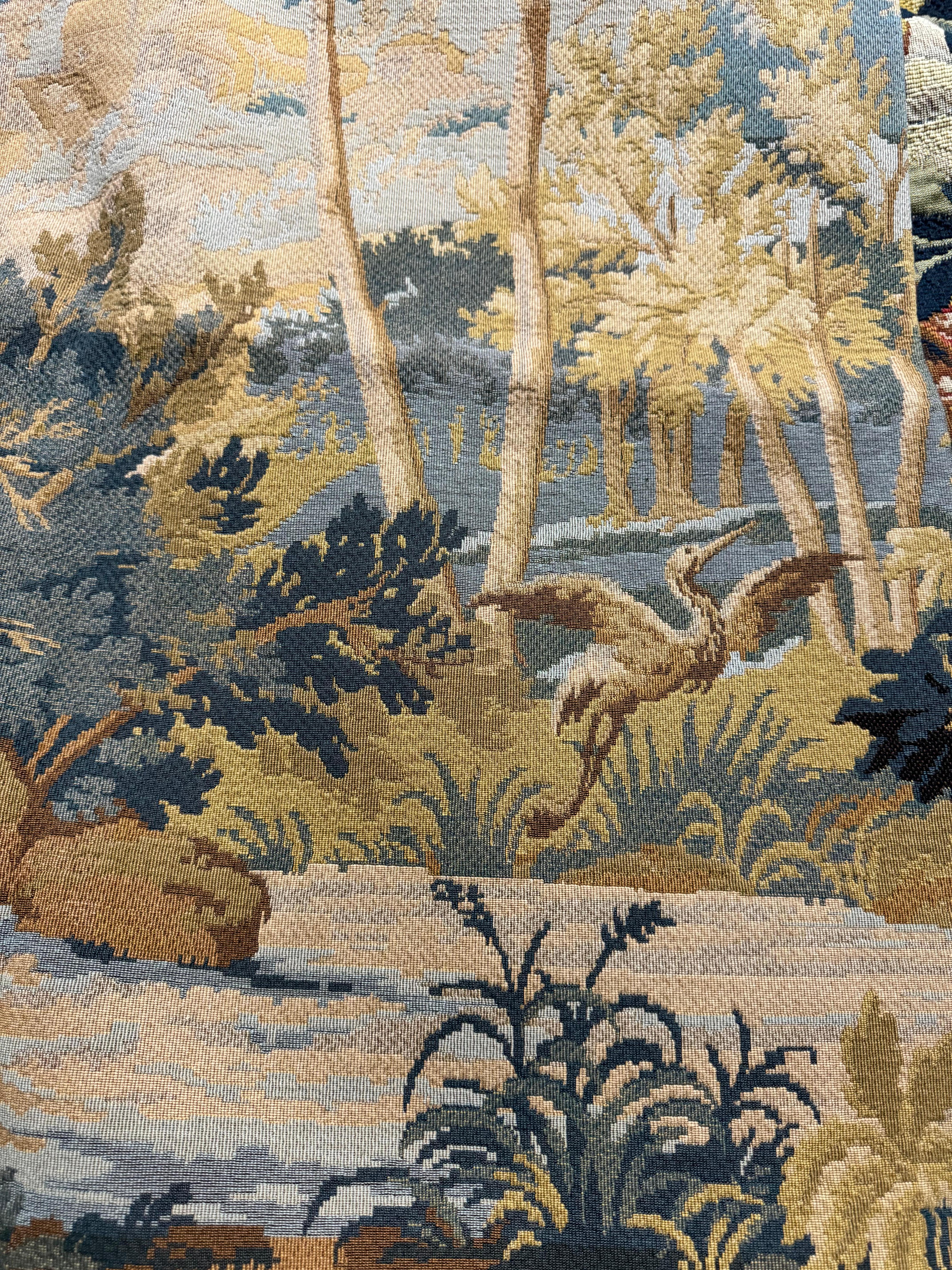 This is our last one in stock of this tapestry, we will be completely sold out when sold!  This one does not have the decorative border.

This tapestry is inspired from a fine example of a classical Verdure Tapestry, such as those woven in France,