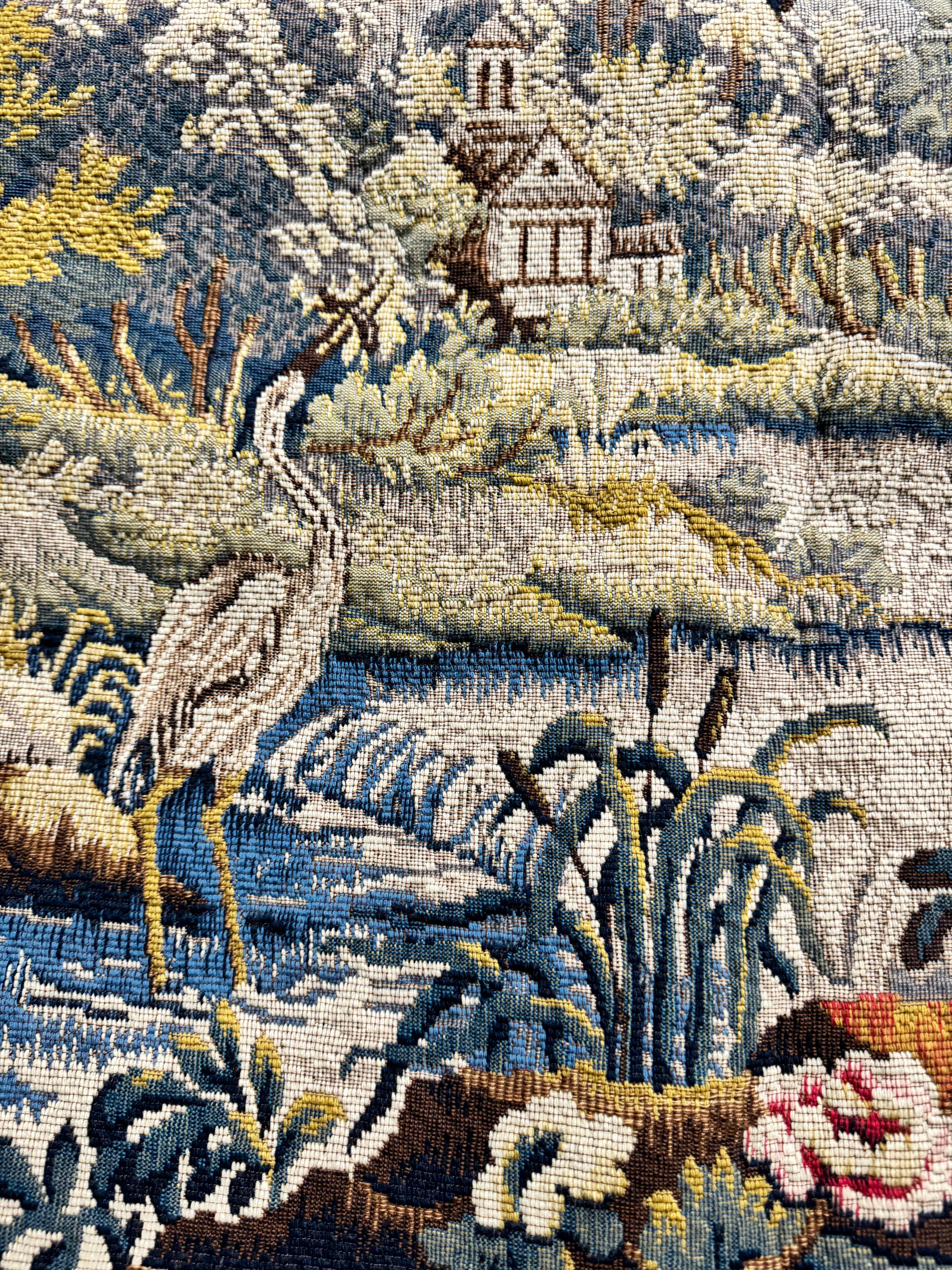  This is our last one in stock at this size!

This is a classical “verdure” tapestry inspired by the one exhibited at the Chevreuse castle (France) and created by the Aubusson Workshops in the 18th century. In the spring mildness and among flowers